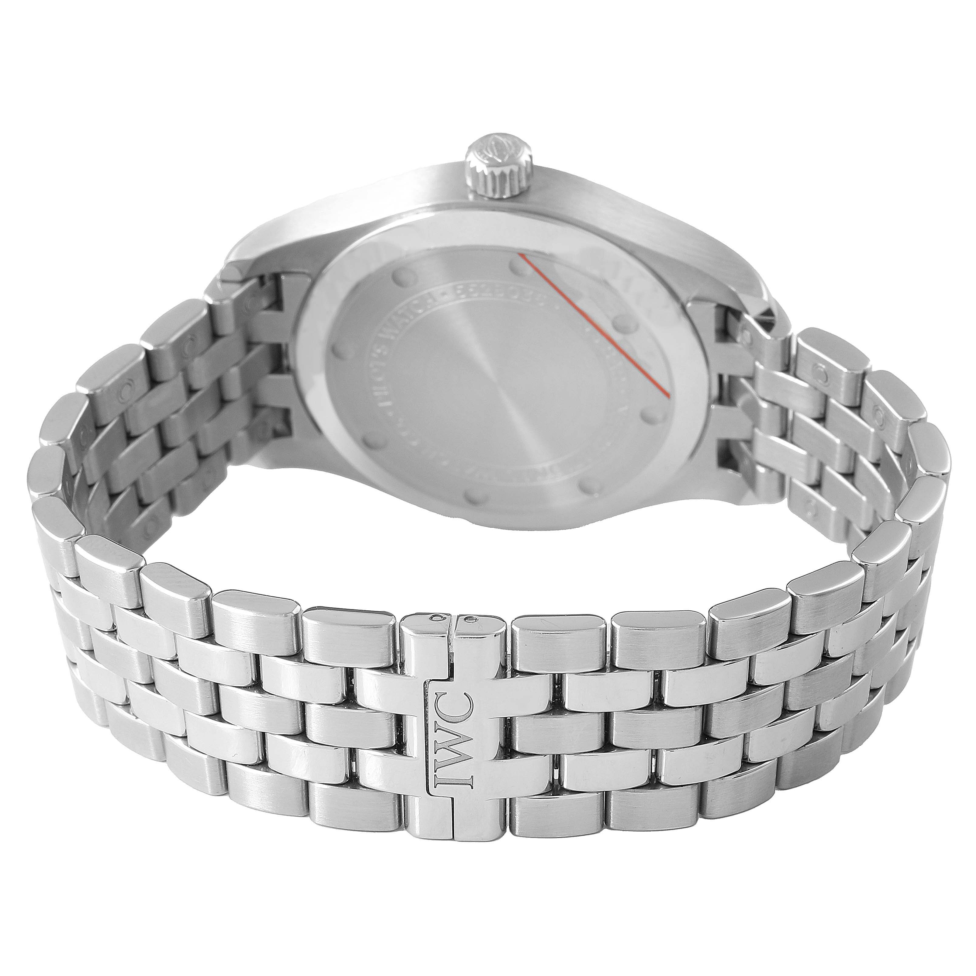 The IWC Pilot IW324006 Men's Stainless Steel Silver Dial model is shown from the back, highlighting the case back, crown, and metal bracelet.