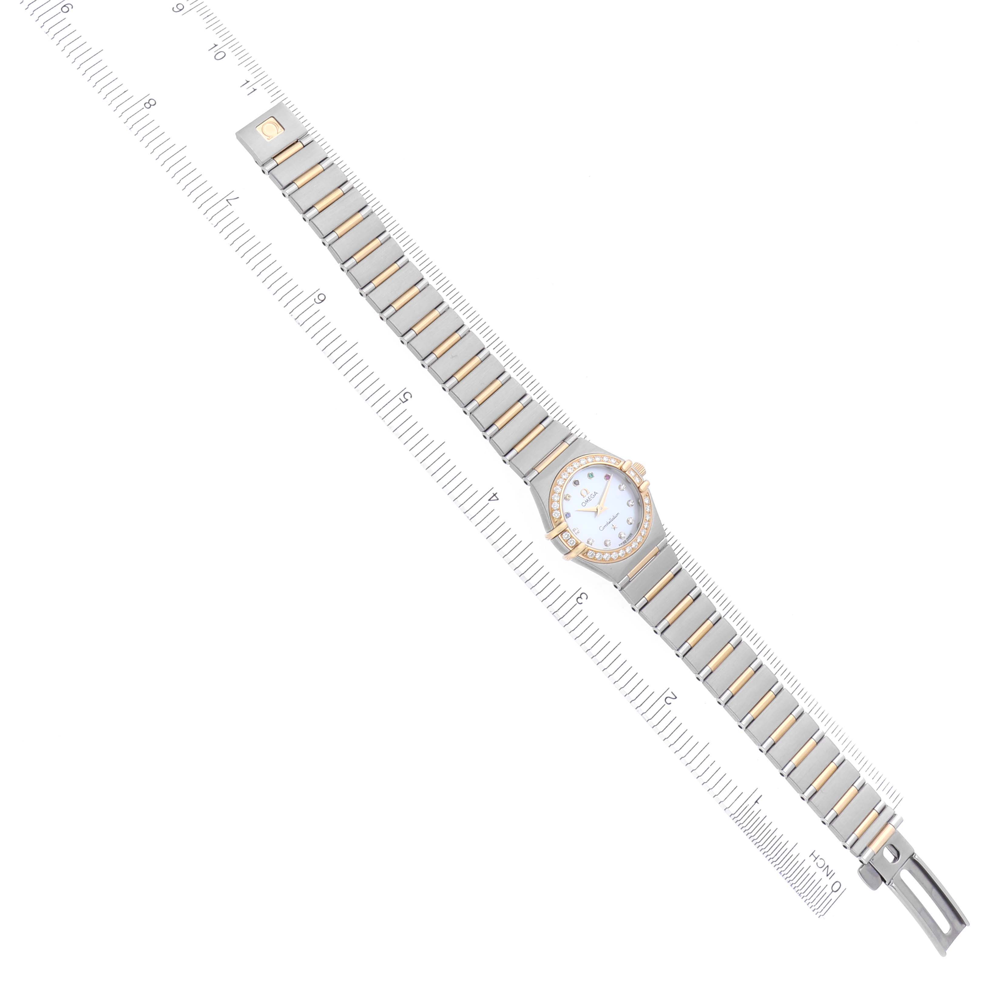 The Omega 111.25.23.60.55.001 Women's Steel and Gold (two tone) Mother of Pearl Dial 111.25.23.60.55.001 Women's Steel and Gold (two tone) Mother of Pearl Dial Constellation Beijing Steel Yellow Gold Diamond Watch is shown fully extended with its face, band, and clasp visible.