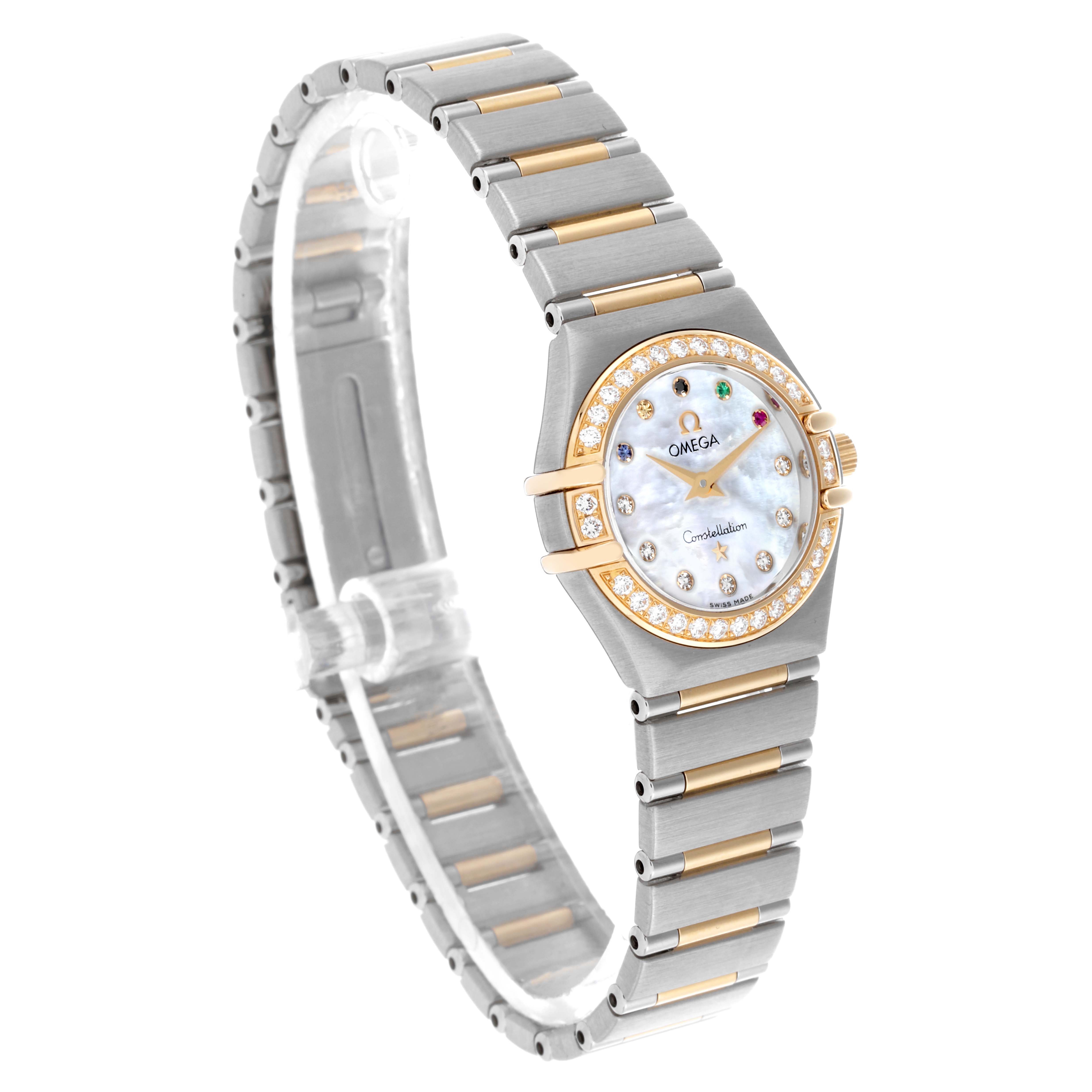 The Omega 111.25.23.60.55.001 Women's Steel and Gold (two tone) Mother of Pearl Dial 111.25.23.60.55.001 Women's Steel and Gold (two tone) Mother of Pearl Dial Constellation Beijing Steel Yellow Gold Diamond Watch is shown at an angled side view, highlighting the bracelet and diamond bezel.