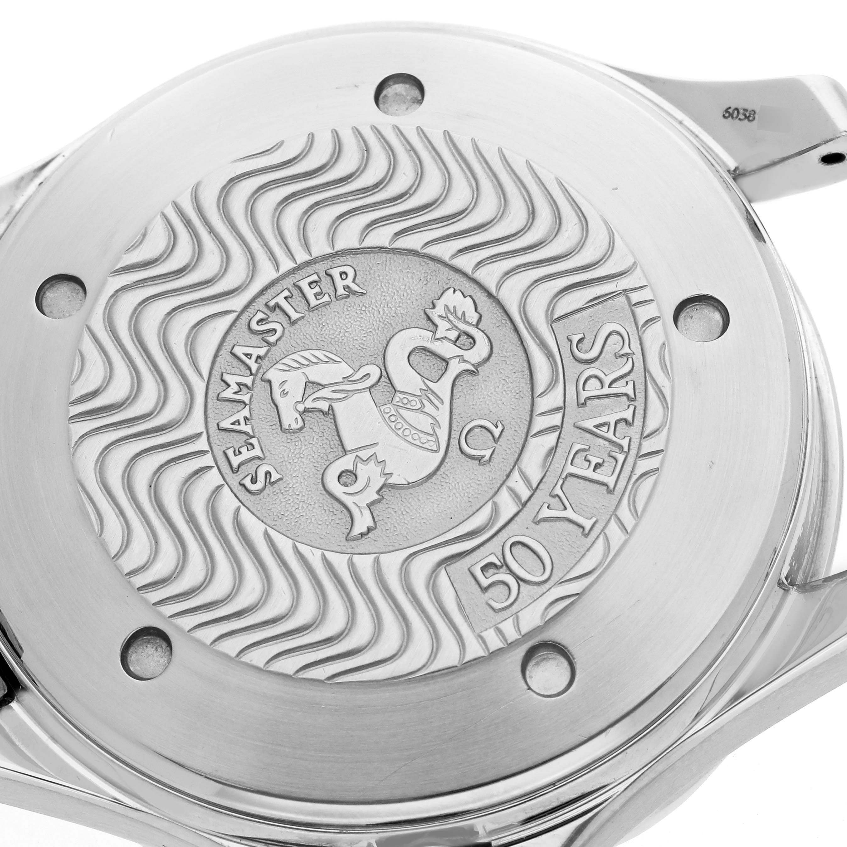 The image shows the case back of the Omega Seamaster 2234.50.00 Men
s Stainless Steel Black Dial 2234.50.00 Men
s Stainless Steel Black Dial watch, featuring an engraved design marking "50 Years."