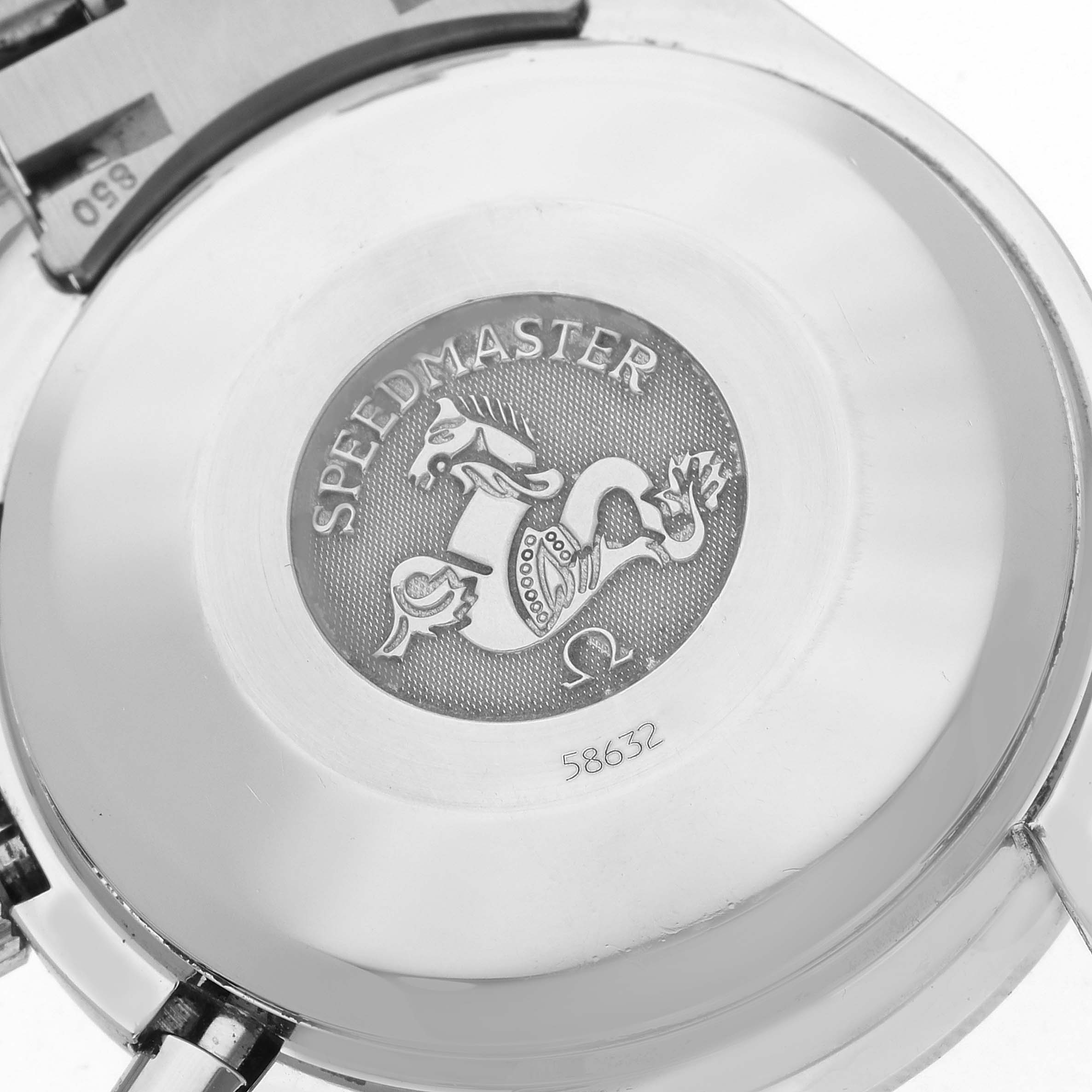 The image shows the case back of an Omega Speedmaster 3520.50.00 Men's Stainless Steel Black Dial 3520.50.00 Men's Stainless Steel Black Dial, featuring the emblem and engraved details.