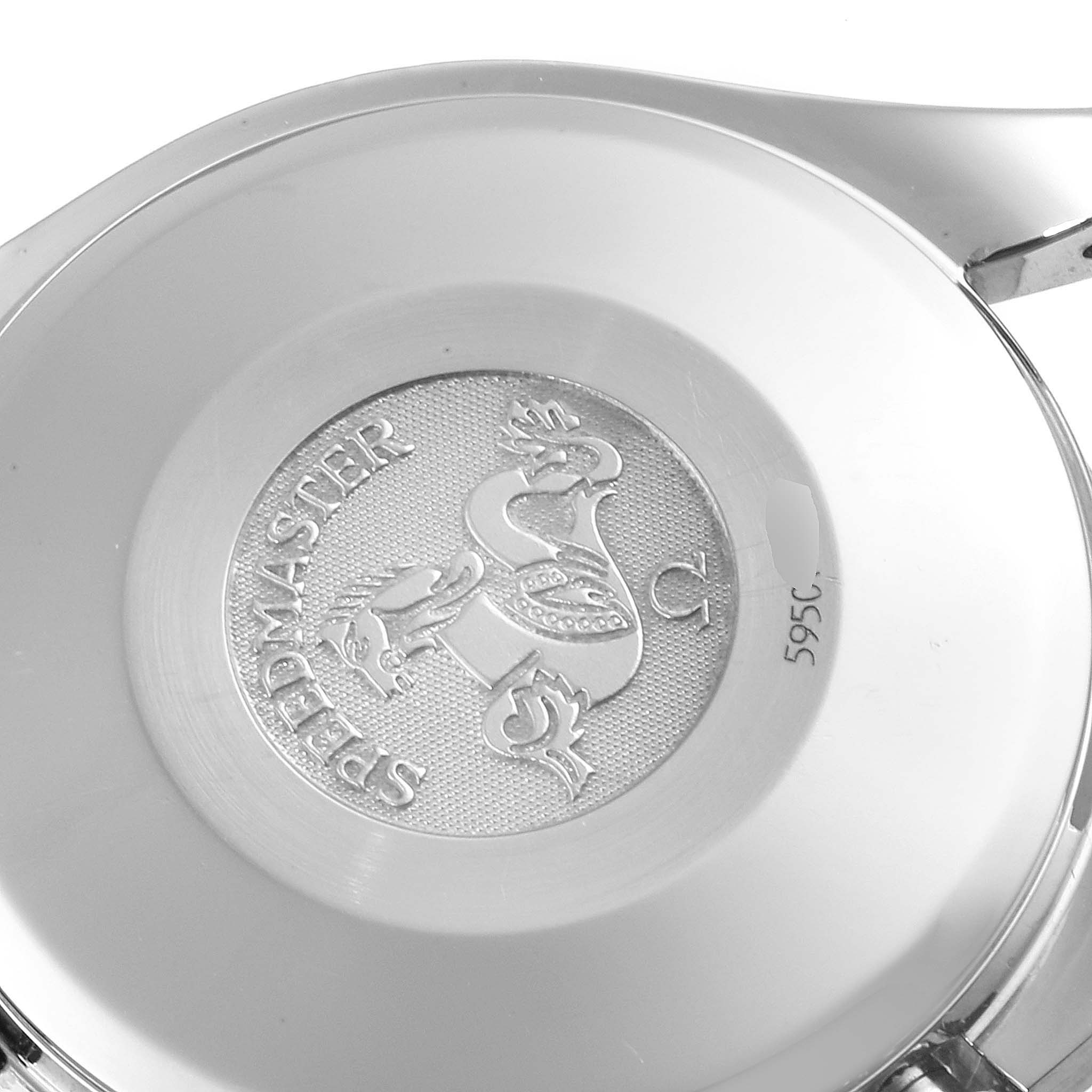 The image shows the back casing of an Omega Speedmaster 3523.80.00 Men
s Stainless Steel Blue Dial 3523.80.00 Men
s Stainless Steel Blue Dial watch featuring the model
s embossed emblem.