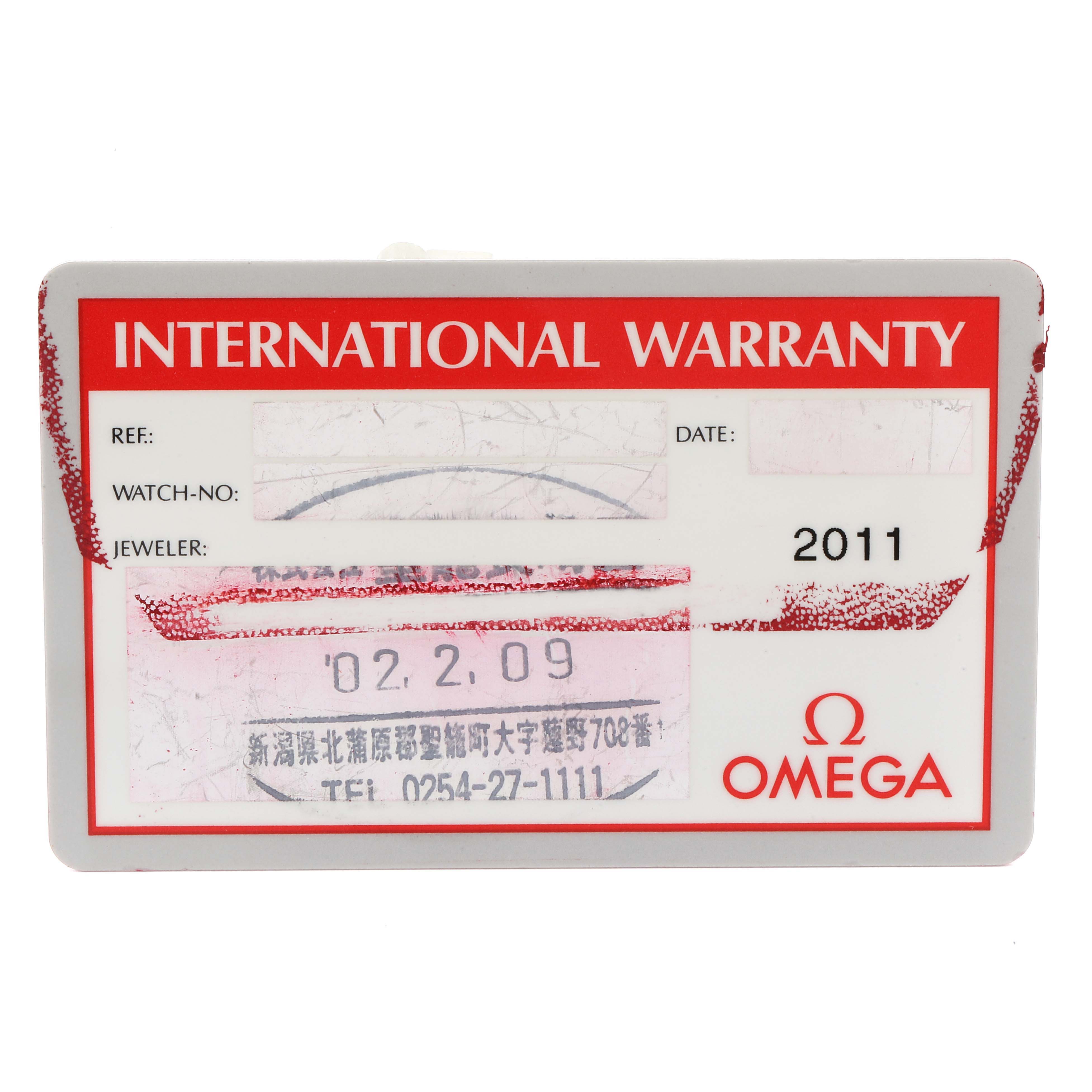 This image shows the front of an Omega Speedmaster 3513.33.00 Men's Stainless Steel White Dial 3513.33.00 Men's Stainless Steel White Dial International Warranty card displaying watch details and date.