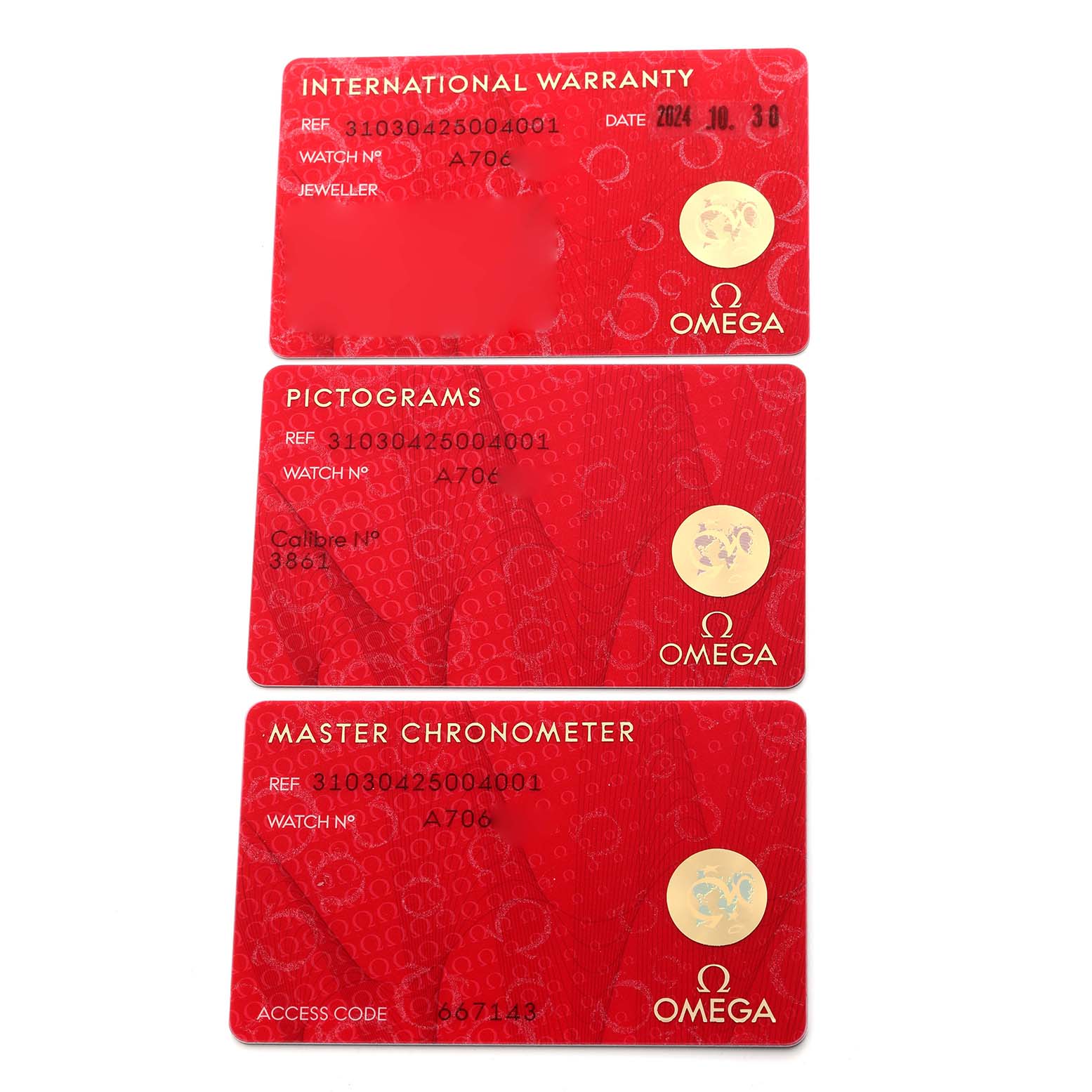 The image shows three red Omega Speedmaster 310.30.42.50.04.001 Men's Stainless Steel White Dial 310.30.42.50.04.001 Men's Stainless Steel White Dial cards: international warranty, pictograms, and master chronometer.