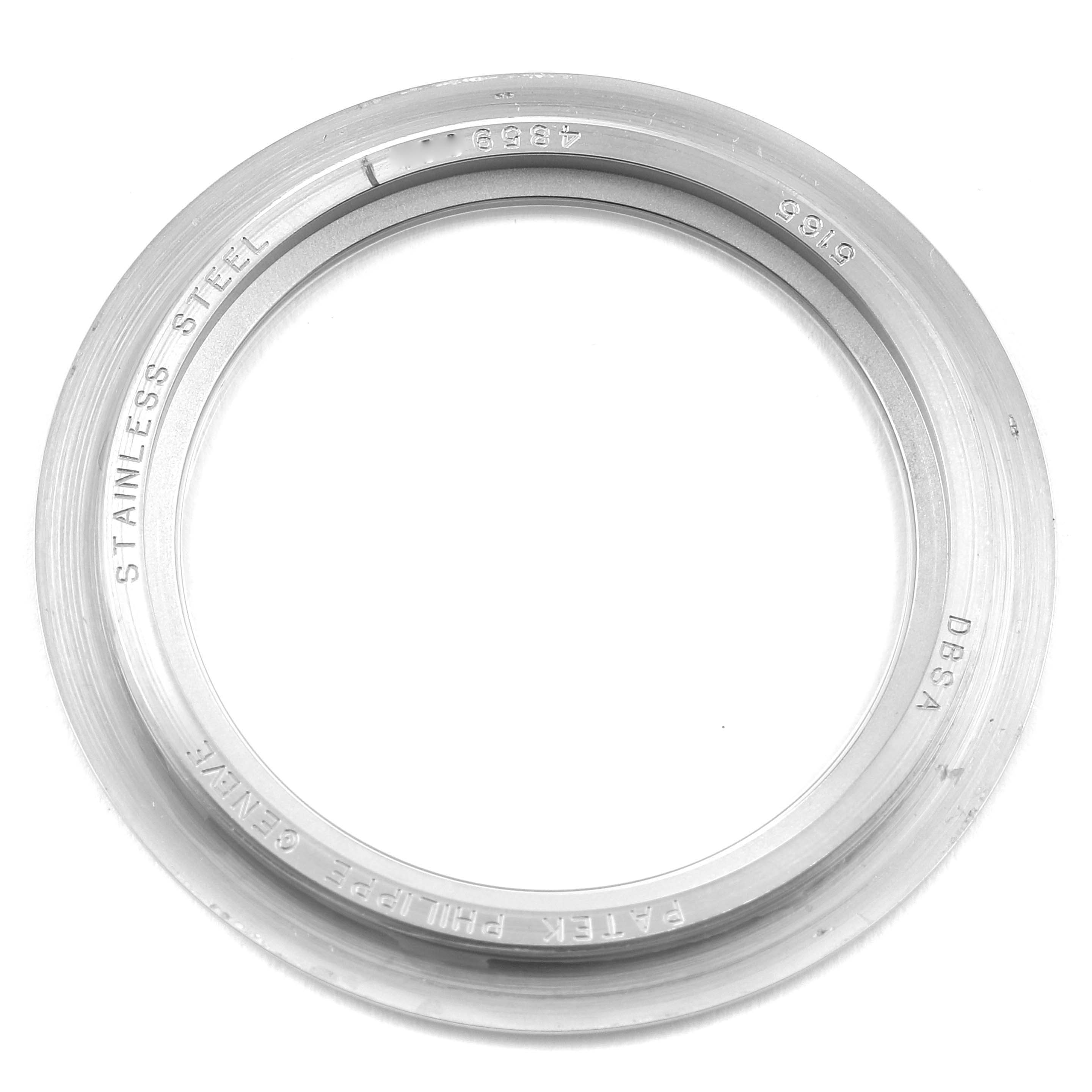 The image shows a top-down view of a stainless steel bezel for a Patek Philippe Aquanaut 5165A-001 Men's Stainless Steel Black Dial 5165A-001 Men's Stainless Steel Black Dial watch.