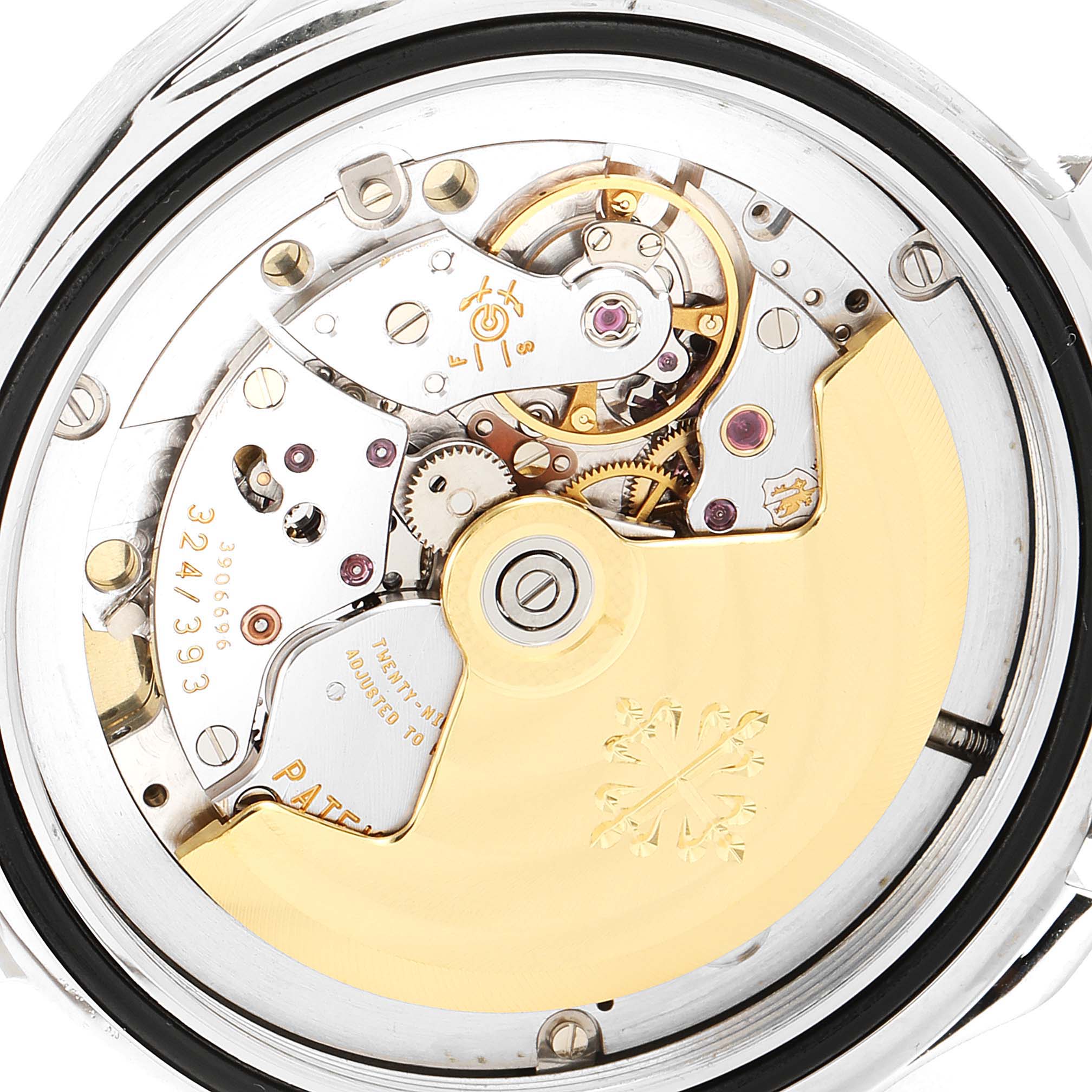 The image shows the movement of a Patek Philippe Aquanaut 5165A-001 Men's Stainless Steel Black Dial 5165A-001 Men's Stainless Steel Black Dial watch from a rear angle, highlighting its intricate inner mechanics.