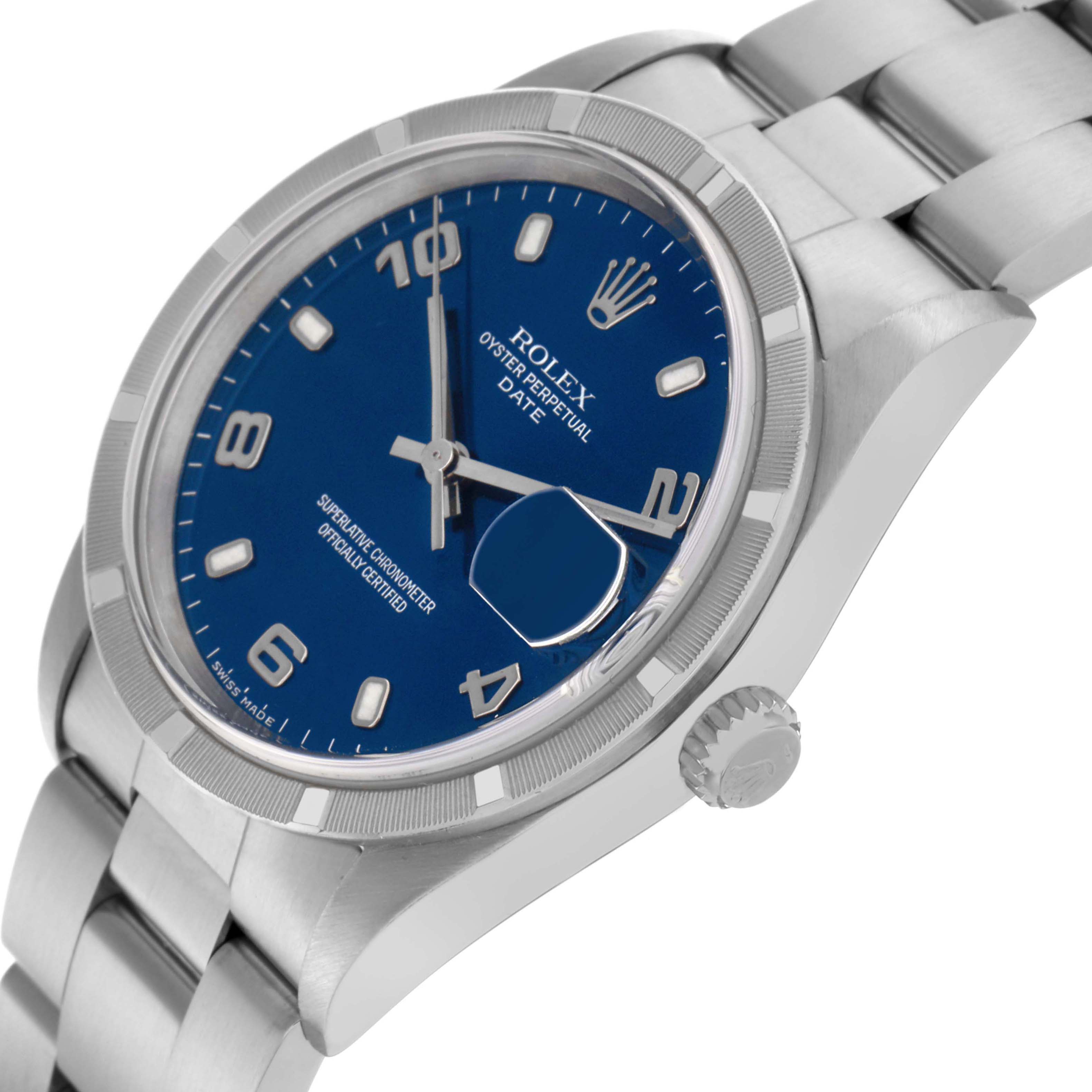 The image shows a Rolex Date 15210 Men
s Stainless Steel Blue Dial 15210 Men
s Stainless Steel Blue Dial model watch at a three-quarter angle, highlighting the blue dial, crown, and stainless steel bracelet.