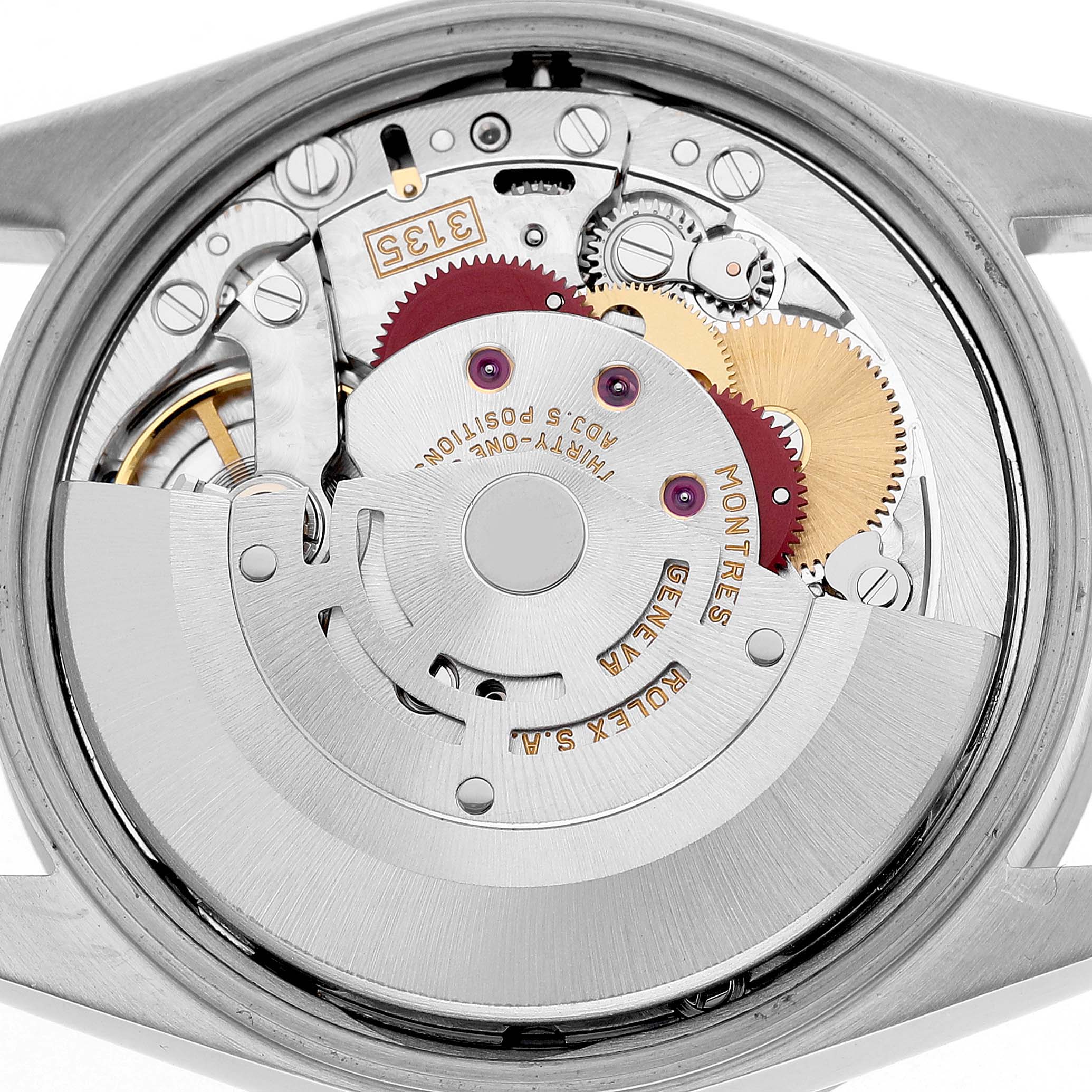 The image shows a close-up view of the movement mechanism of a Rolex Date 15210 Men's Stainless Steel Pink Dial watch.