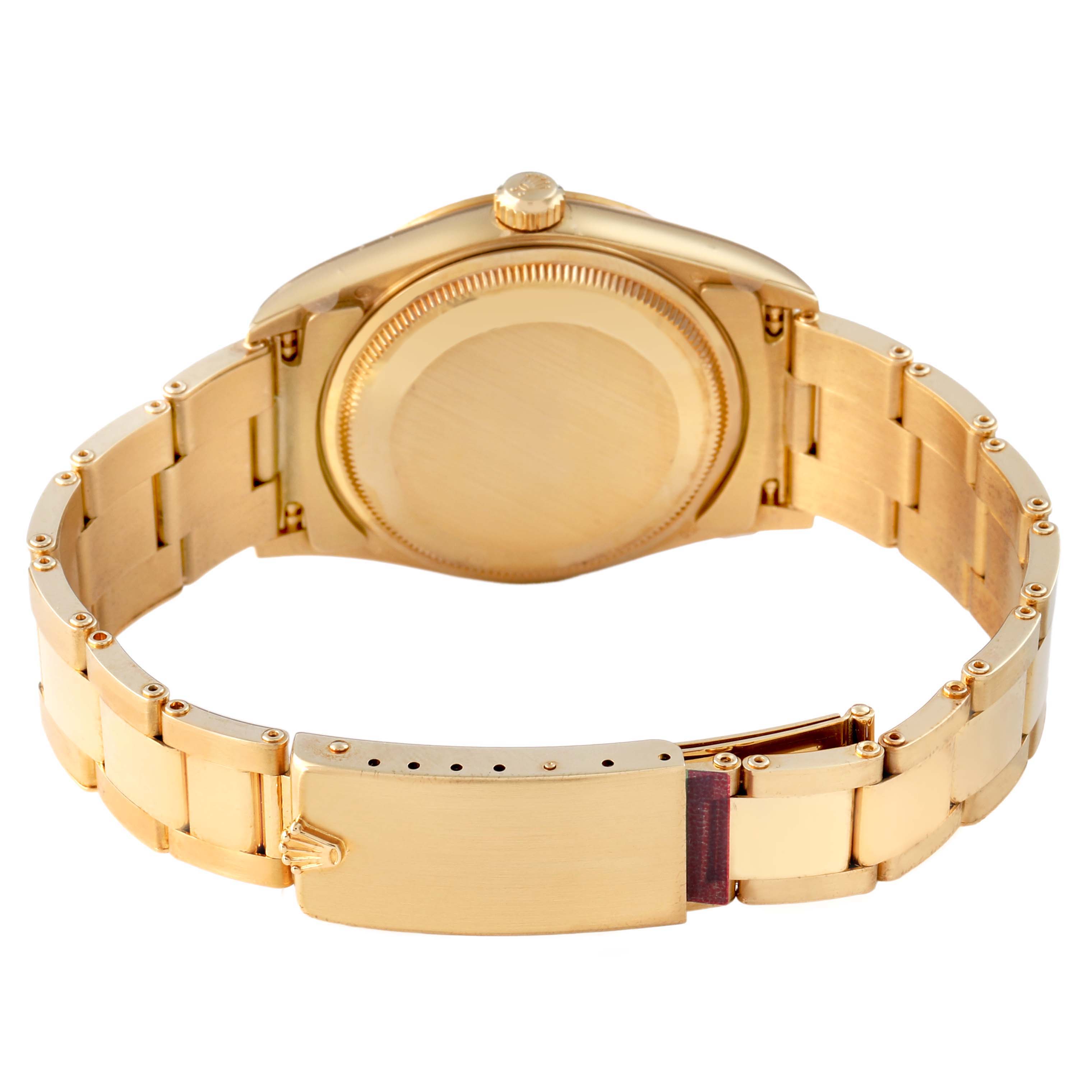 The image shows the back view of a Rolex Date 15238 Men's Yellow Gold Champagne Dial model, highlighting the gold bracelet and closed clasp.