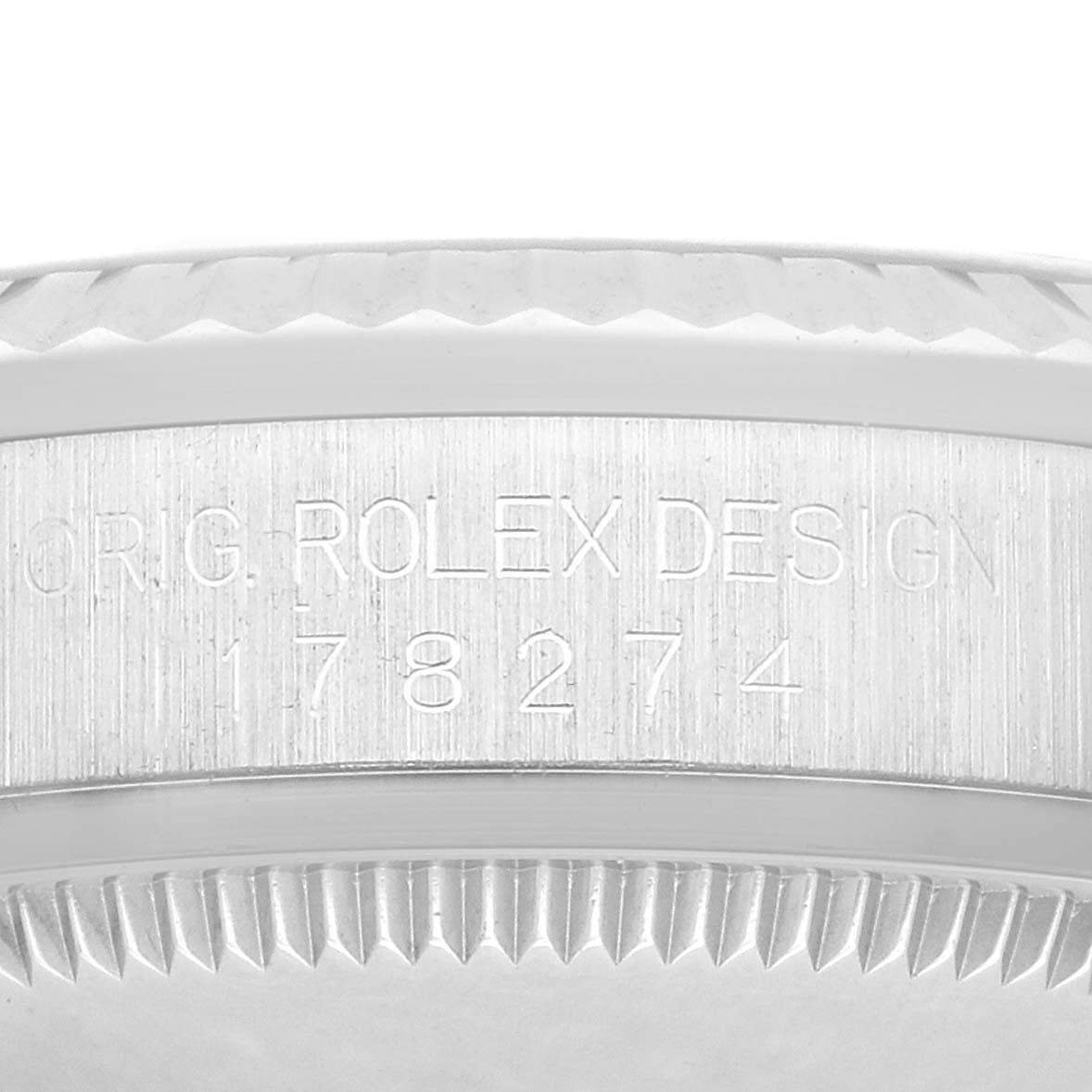 The image shows a close-up of the side of a Rolex Datejust case, highlighting the engraved model details.