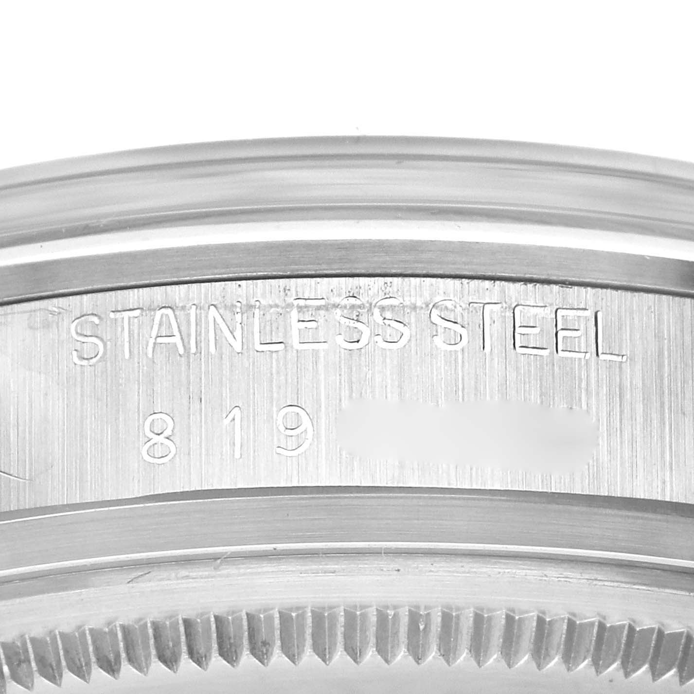 The image shows the side view of the caseback and bezel of a Rolex Datejust 16000 Men's Stainless Steel White Dial 16000 Men's Stainless Steel White Dial, highlighting the stainless steel marking.