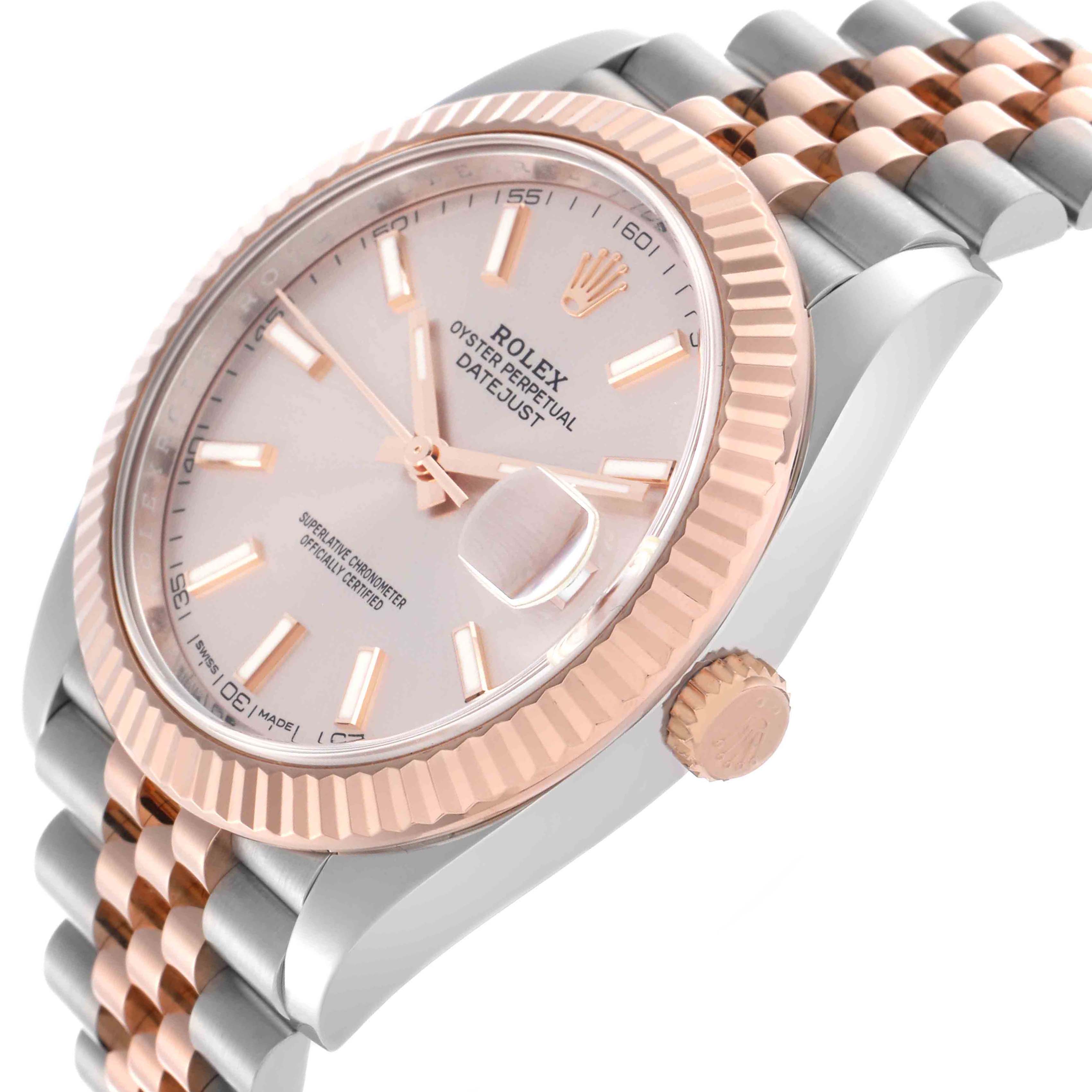 The Rolex Datejust 41 126331 Men
s Steel and Gold (two tone) Pink Dial 126331 Men
s Steel and Gold (two tone) Pink Dial is shown at an angled close-up, highlighting its fluted bezel, dial, and Jubilee bracelet.