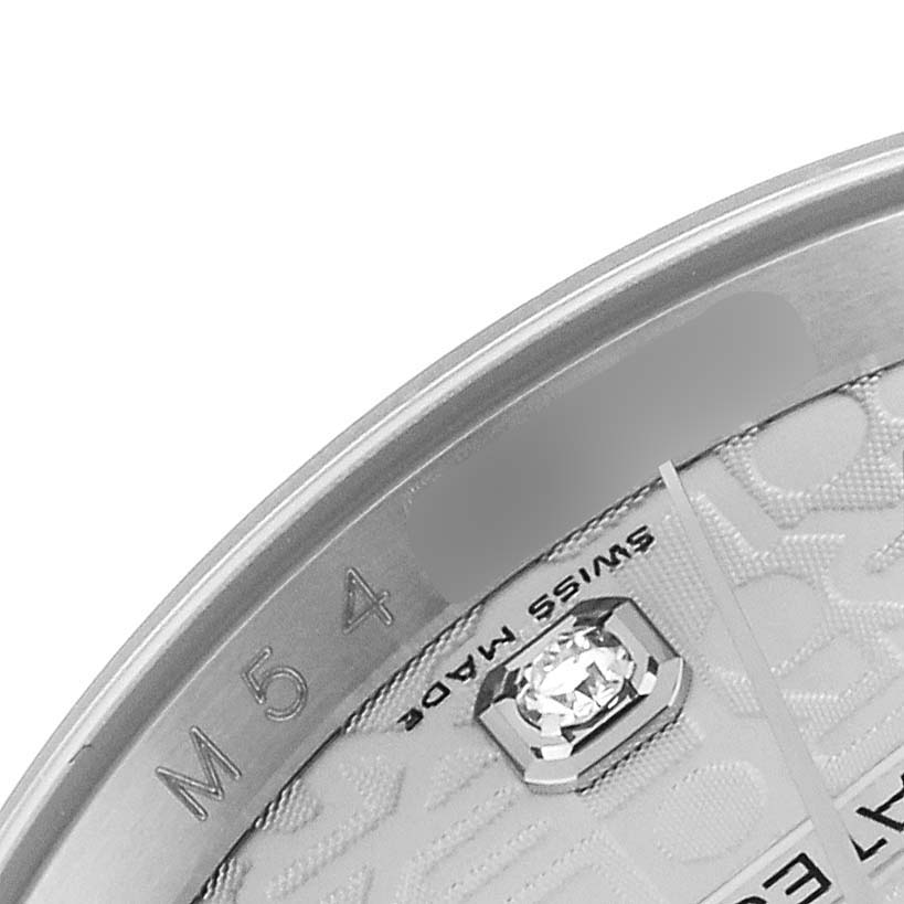 This image shows a close-up of the dial and bezel edge of a Rolex Datejust 116234 Men's Stainless Steel Silver Dial 116234 Men's Stainless Steel Silver Dial watch, highlighting the "Swiss Made" label and a diamond hour marker.