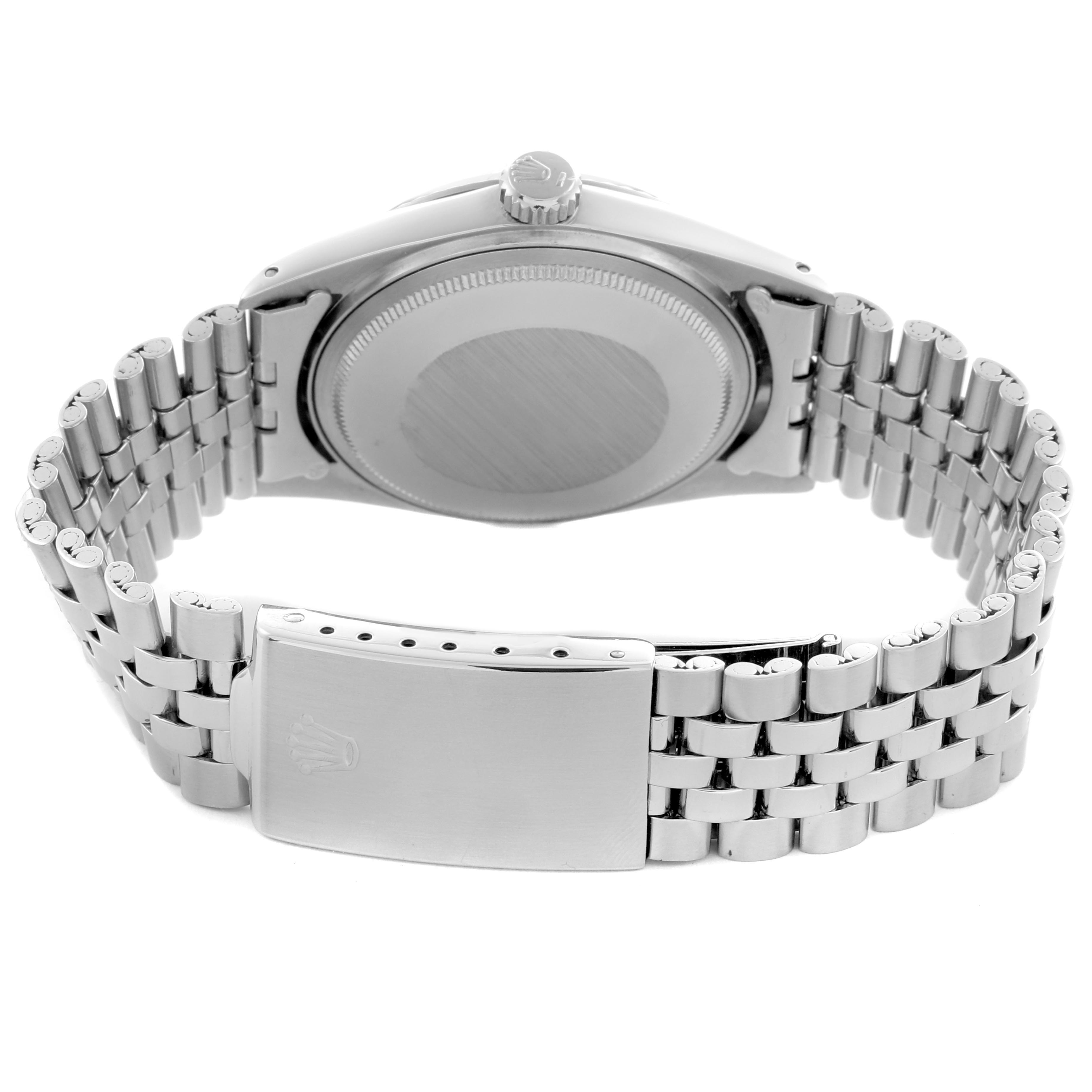 The image shows the back of a Rolex Datejust 1601 Men's Stainless Steel White Dial 1601 Men's Stainless Steel White Dial watch, highlighting the case back, bracelet, and clasp.