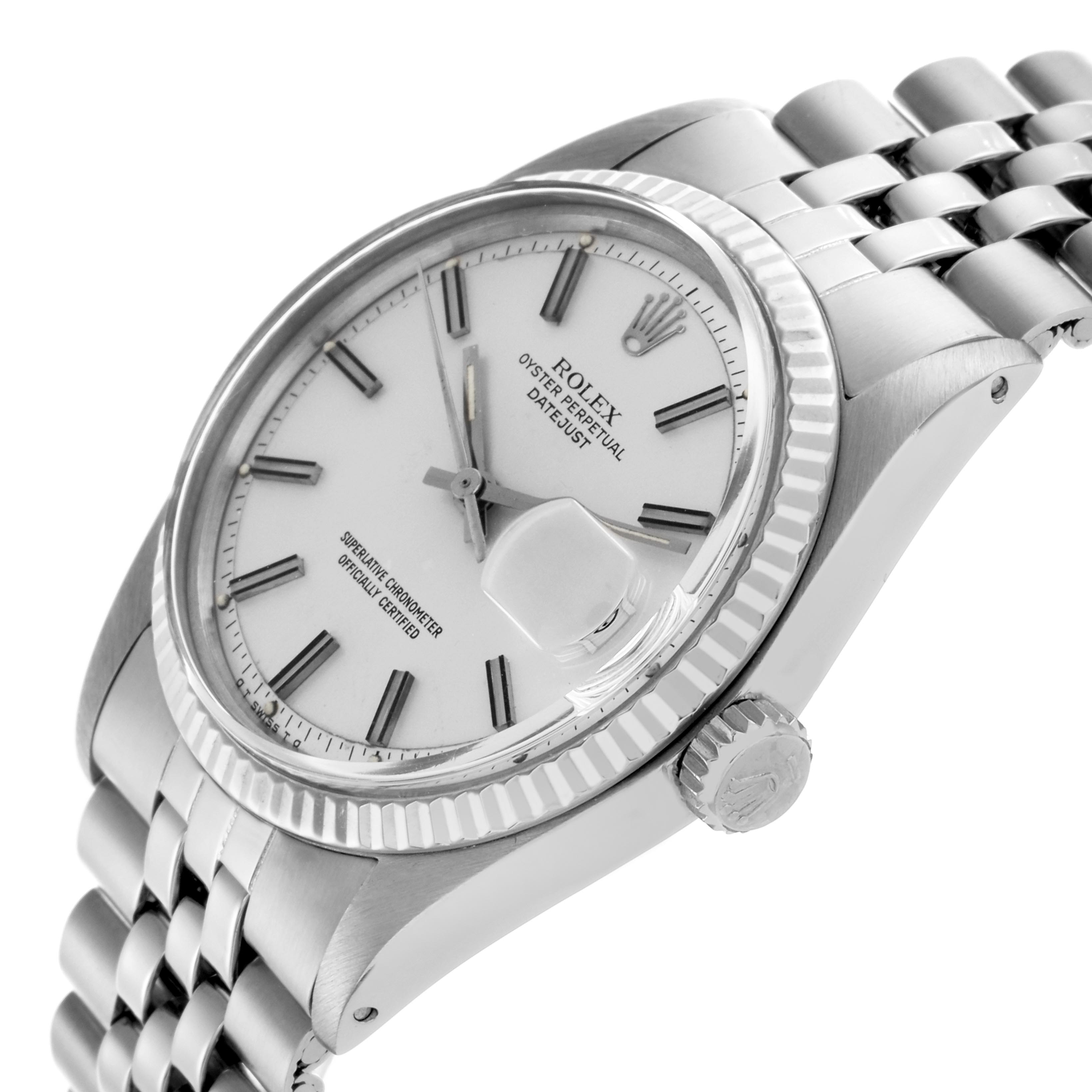 The Rolex Datejust 1601 Men's Stainless Steel White Dial 1601 Men's Stainless Steel White Dial is shown at an angle highlighting the dial, fluted bezel, and a segment of the jubilee bracelet.