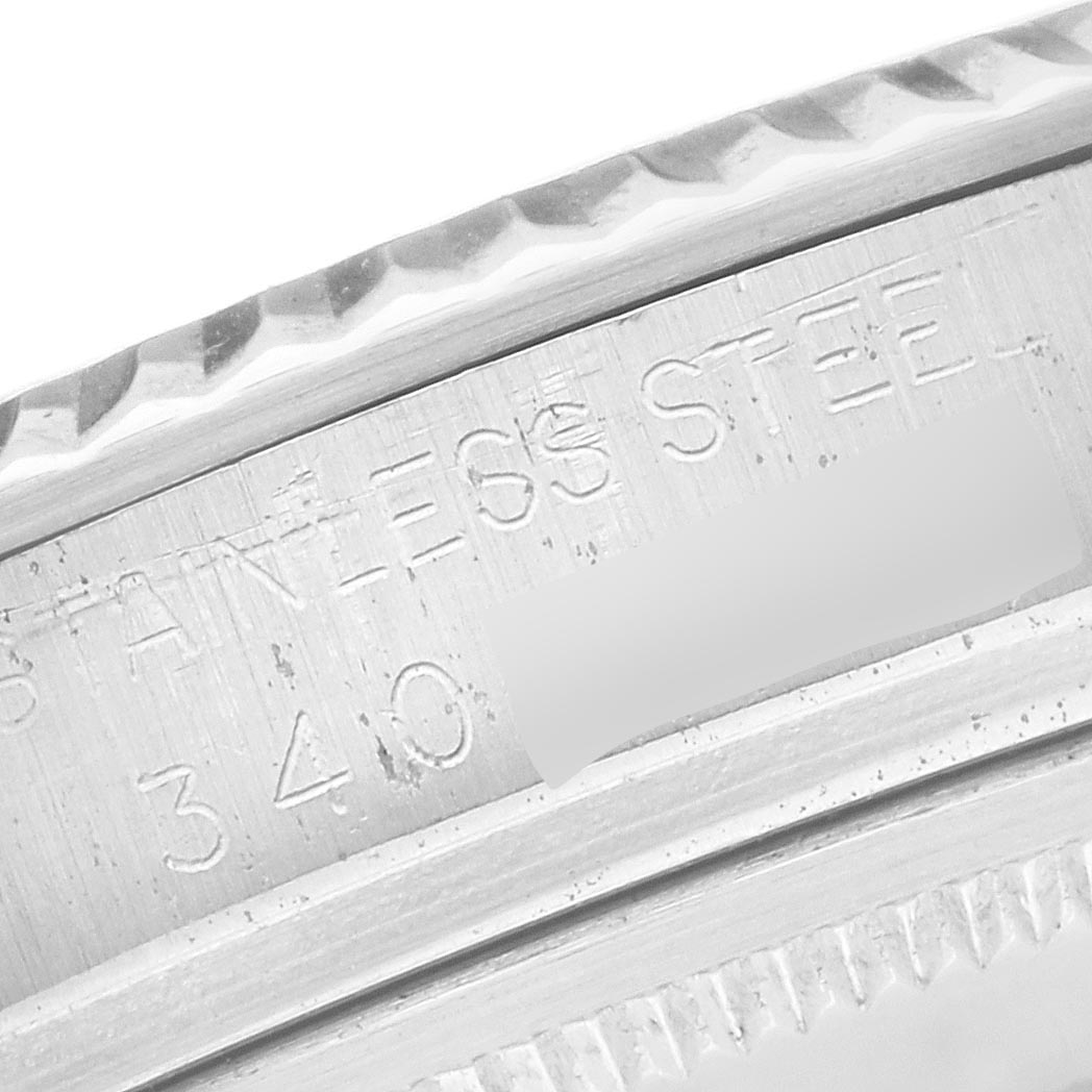 The image shows an engraved section of a Rolex Datejust 1601 Men's Stainless Steel White Dial 1601 Men's Stainless Steel White Dial, focusing on the case's inner side.