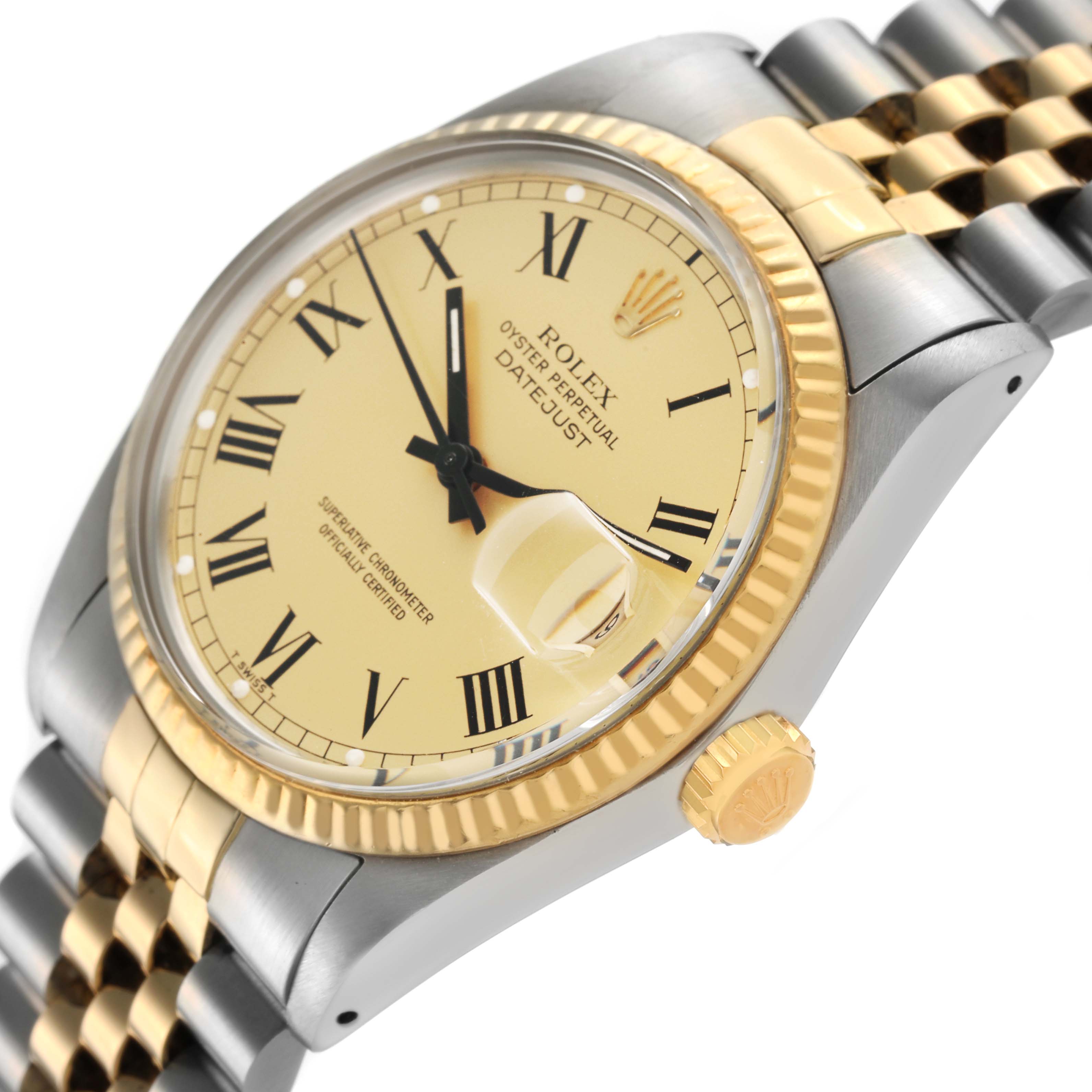 The image shows a Rolex Datejust 16013 Men's Steel and Gold (two tone) Champagne Dial watch at a three-quarter angle, highlighting the dial, crown, bezel, and part of the bracelet.