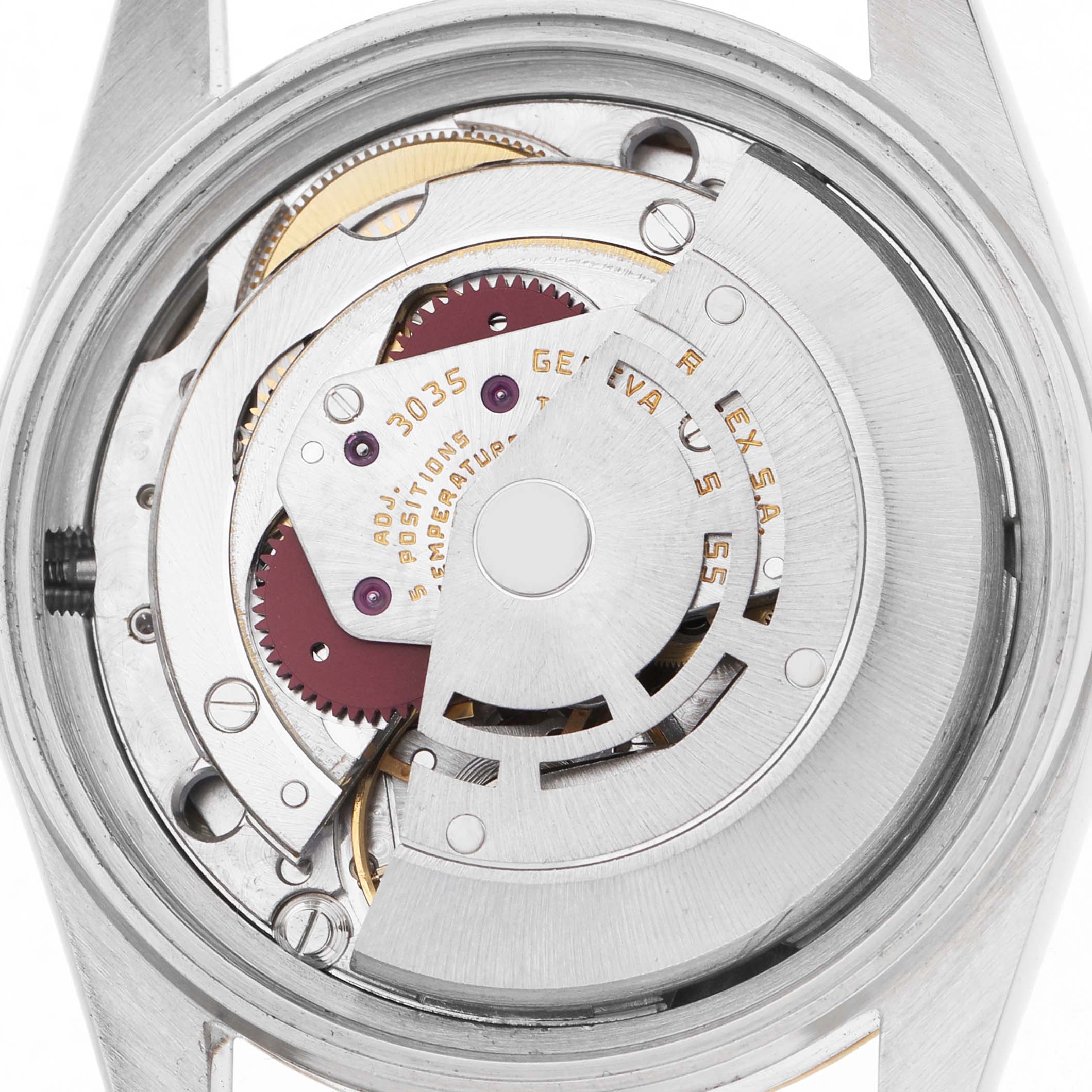 This image shows the movement of a Rolex Datejust 16013 Men's Steel and Gold (two tone) Champagne Dial, focusing on the mechanical components and rotor from the back.