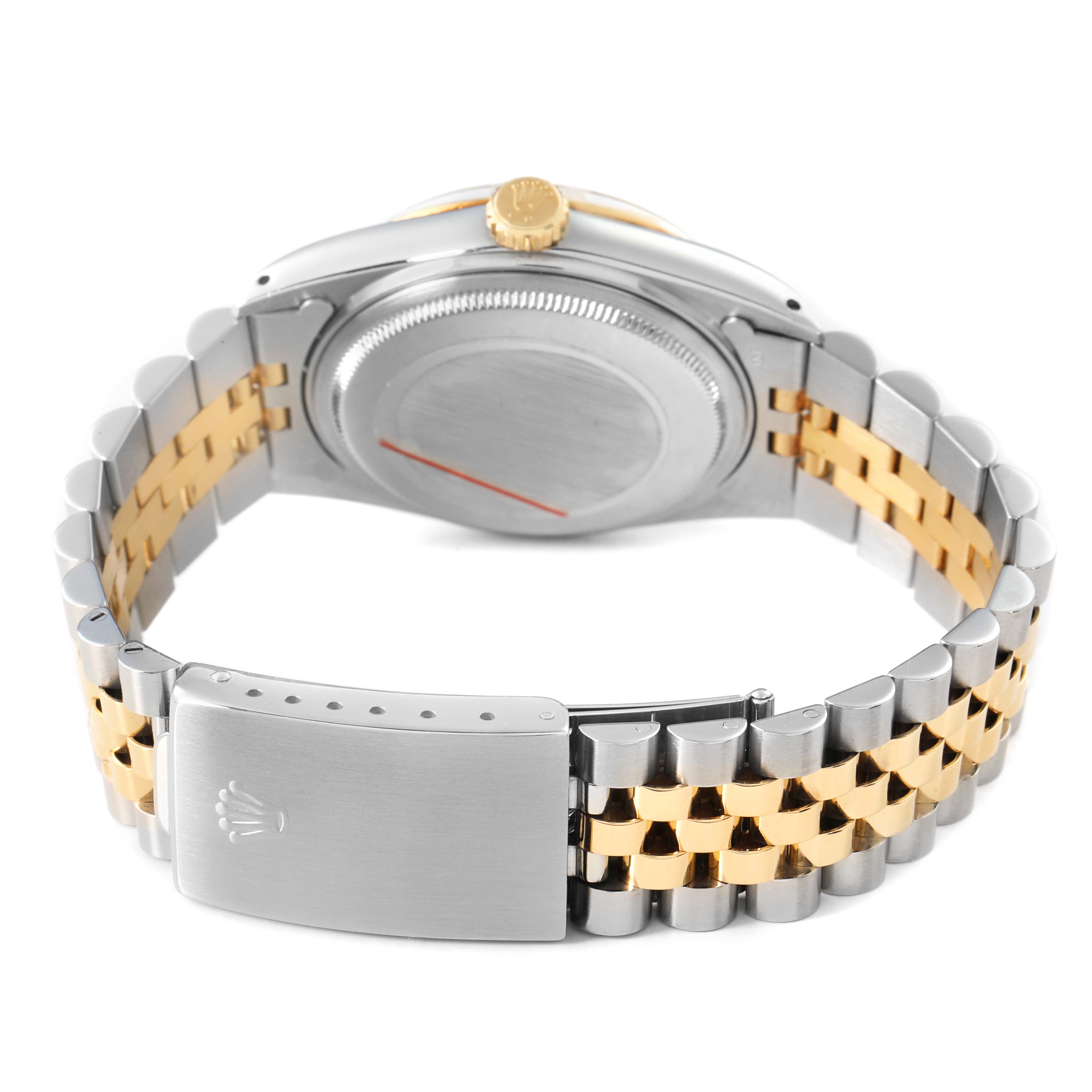 The image shows the back of a Rolex Datejust 16013 Men's Steel and Gold (two tone) Champagne Dial, highlighting the case back, crown, two-tone Jubilee bracelet, and clasp.