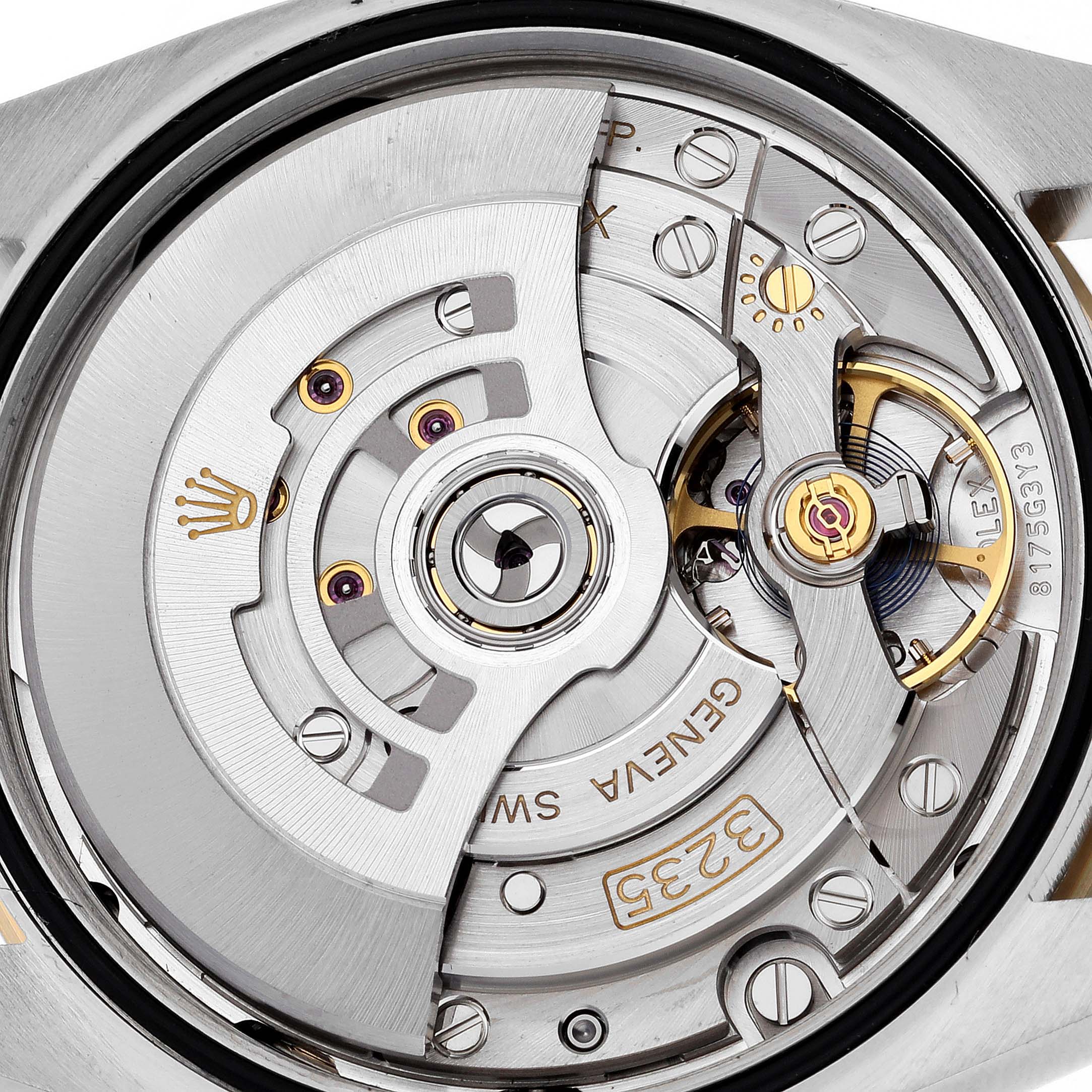 This image shows the intricate internal mechanical movement of the Rolex Datejust 126233 Men's Steel and Gold (two tone) White Dial 126233 Men's Steel and Gold (two tone) White Dial watch from the backside angle.