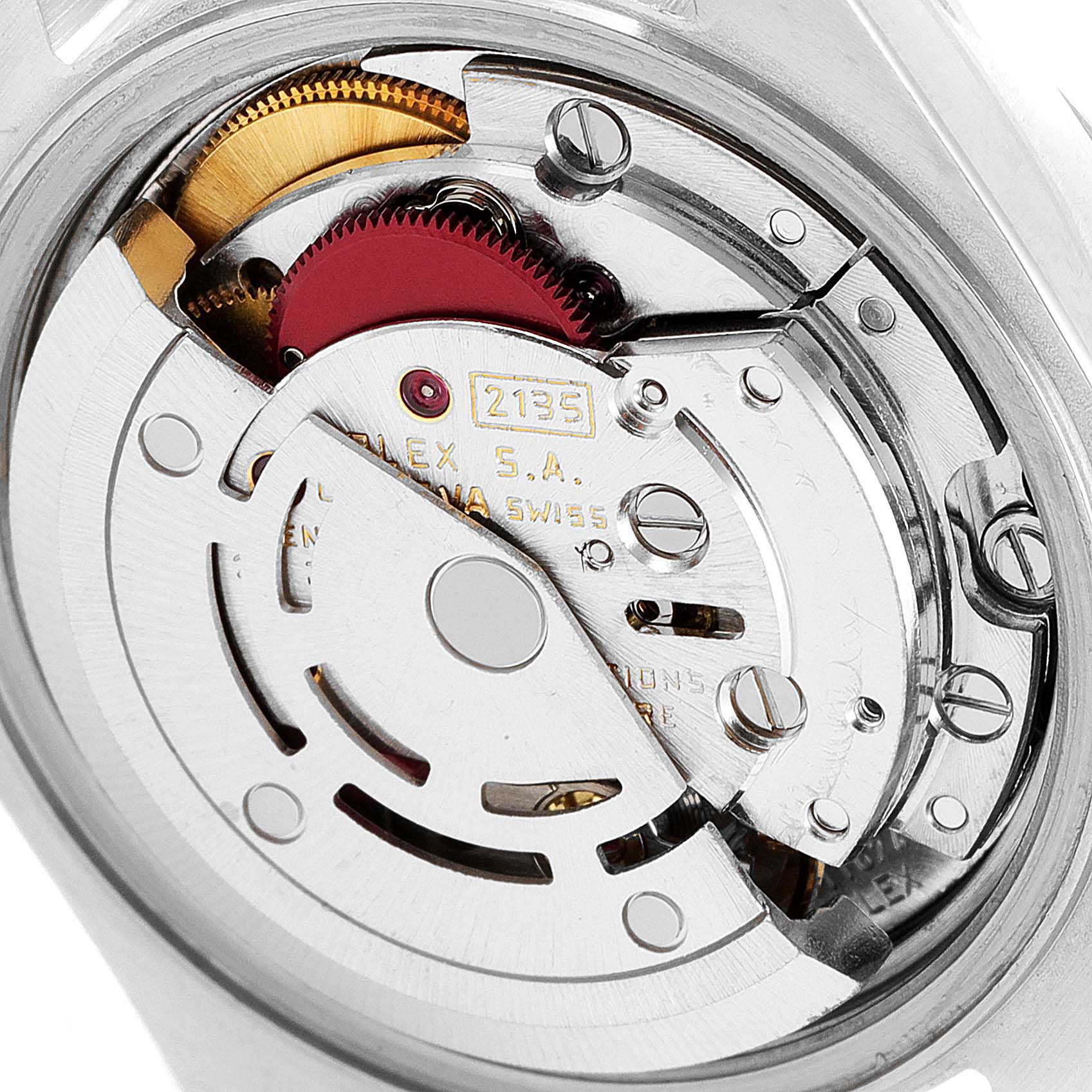 This image shows a close-up view of the internal mechanics and movement of the Rolex Datejust 69173 Women's Steel and Gold (two tone) White Dial 69173 Women's Steel and Gold (two tone) White Dial watch.