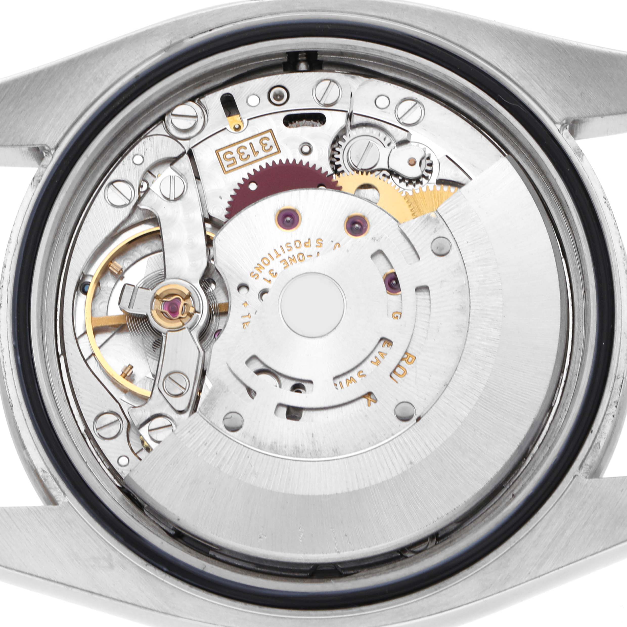 The image shows the internal movement of a Rolex Turn-o-Graph 116264 Men's Stainless Steel Black Dial 116264 Men's Stainless Steel Black Dial, highlighting gears and mechanical components from a back view.