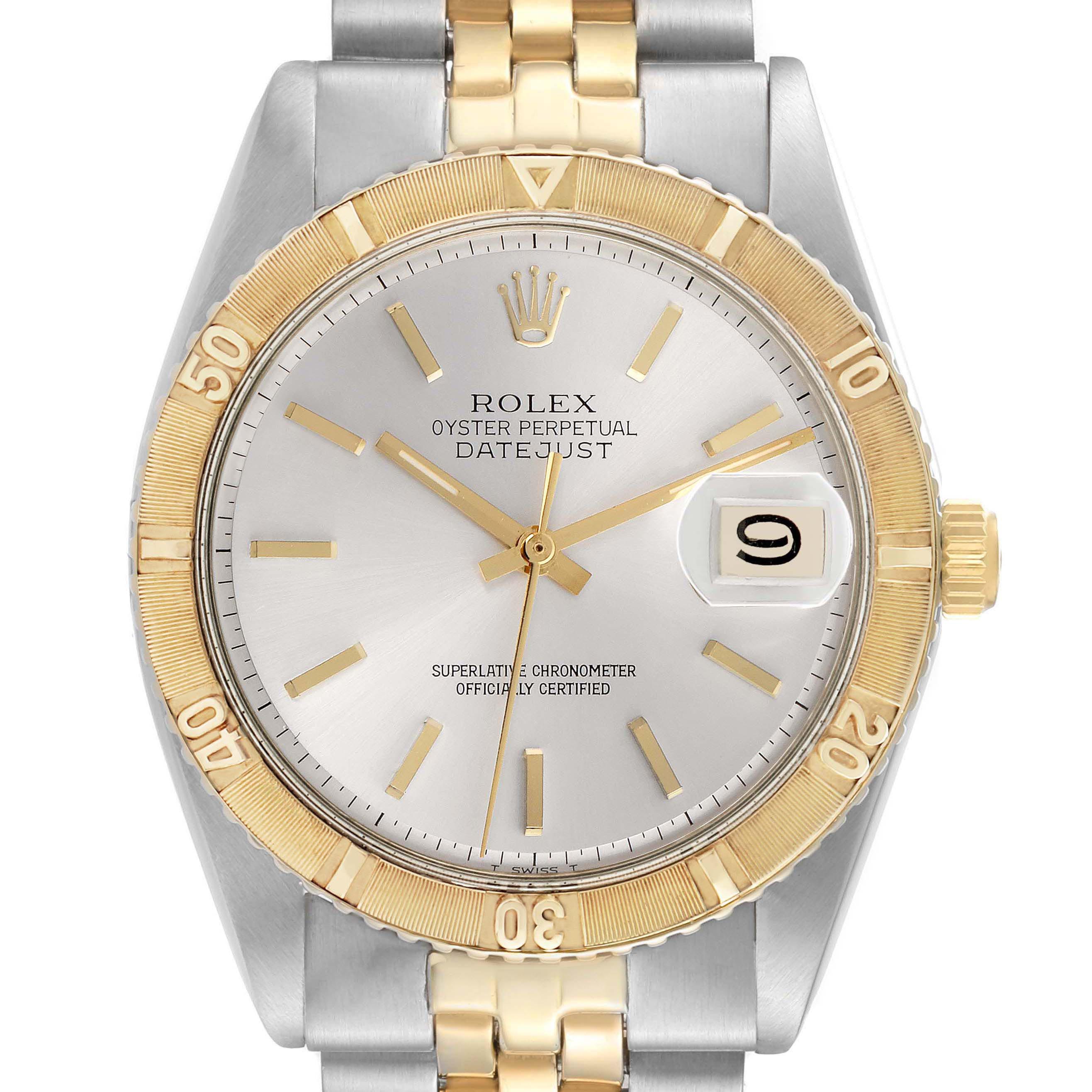 The image shows a frontal view of the Rolex Turn-o-Graph 1625 Men's Steel and Gold (two tone) Silver Dial 1625 Men's Steel and Gold (two tone) Silver Dial watch, featuring its gold bezel, dial, hands, date window, and two-tone bracelet.