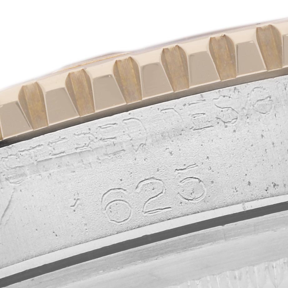 The image shows a close-up of the bezel and engraved case side of the Rolex Turn-o-Graph 1625 Men's Steel and Gold (two tone) Silver Dial 1625 Men's Steel and Gold (two tone) Silver Dial.