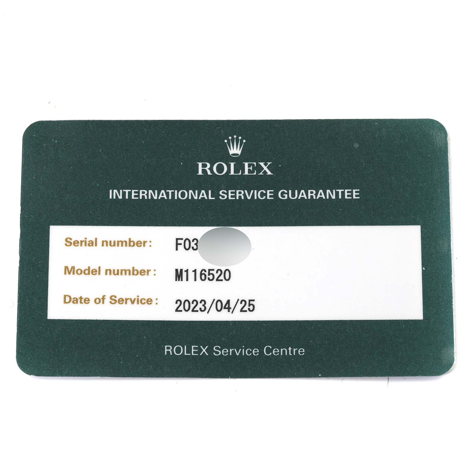 The image shows an "International Service Guarantee" card for the Rolex Daytona 116520 Men's Stainless Steel White Dial 116520 Men's Stainless Steel White Dial model M116520, including the serial number and service date.