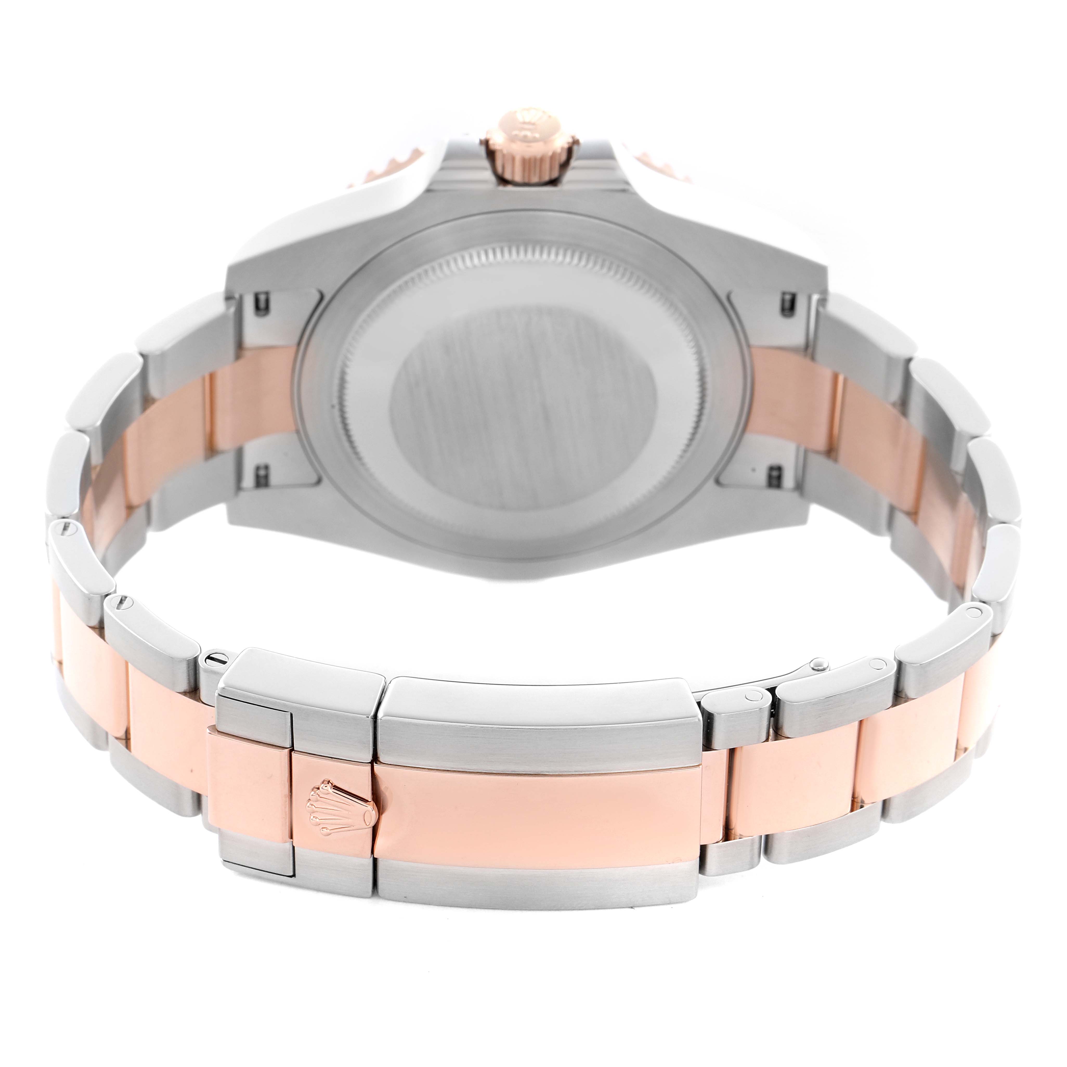 The image shows the back view of the Rolex GMT-Master 126711CHNR Men
s Steel and Gold (two tone) Black Dial 126711CHNR Men
s Steel and Gold (two tone) Black Dial, highlighting the clasp, bracelet, and stainless steel case back.