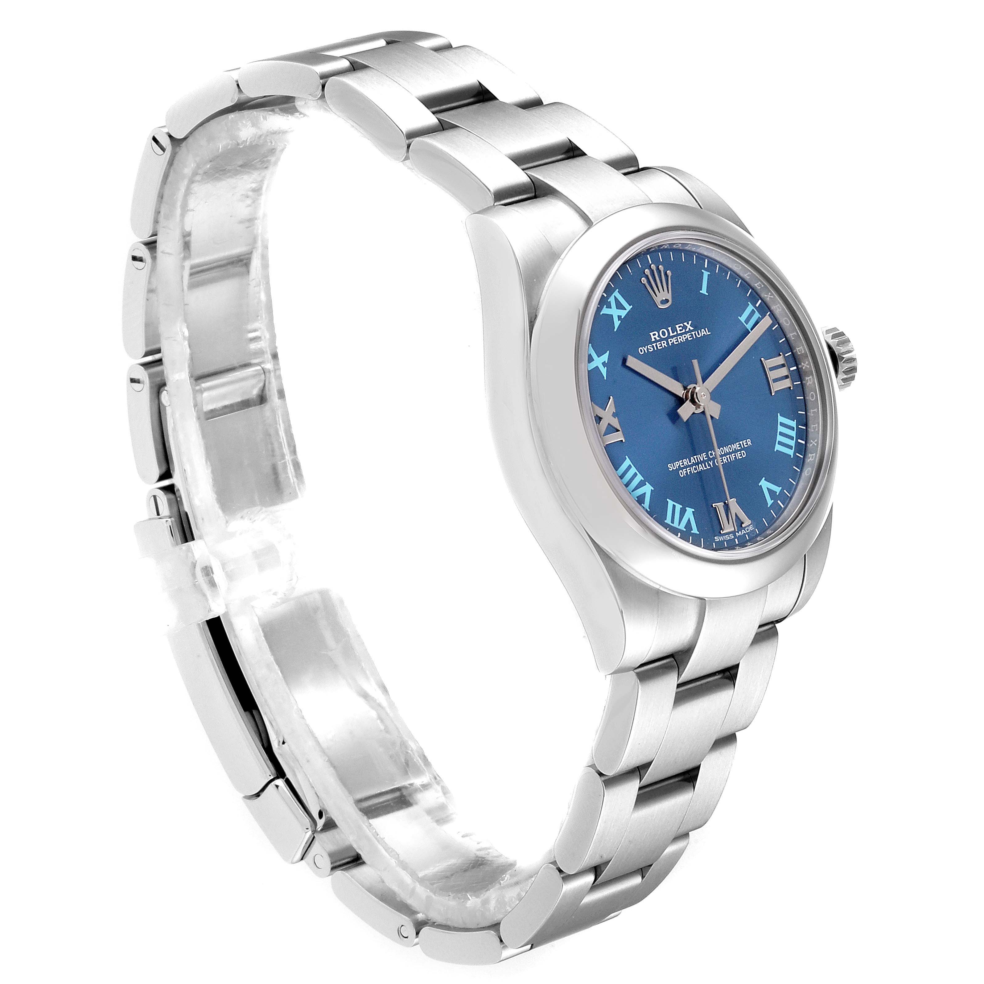 The image shows a side angle of a Rolex Mid-Size 177200 Women
s Stainless Steel Blue Dial 177200 Women
s Stainless Steel Blue Dial watch, featuring its blue dial, crown, and stainless steel bracelet.
