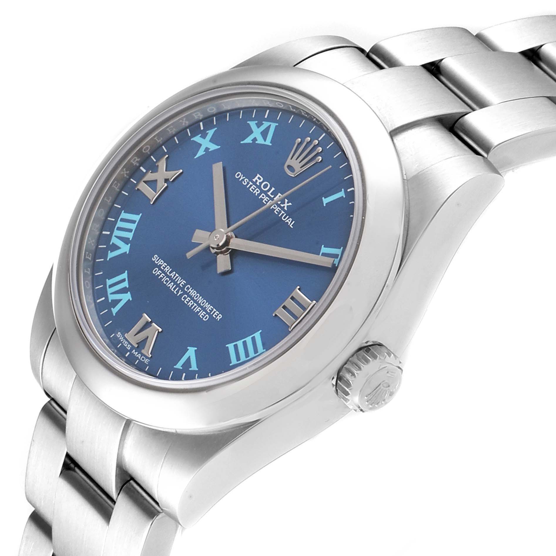 The image shows a Rolex Mid-Size 177200 Women
s Stainless Steel Blue Dial 177200 Women
s Stainless Steel Blue Dial Oyster Perpetual watch with a blue dial, Roman numerals, and a stainless steel bracelet at an angled side view.