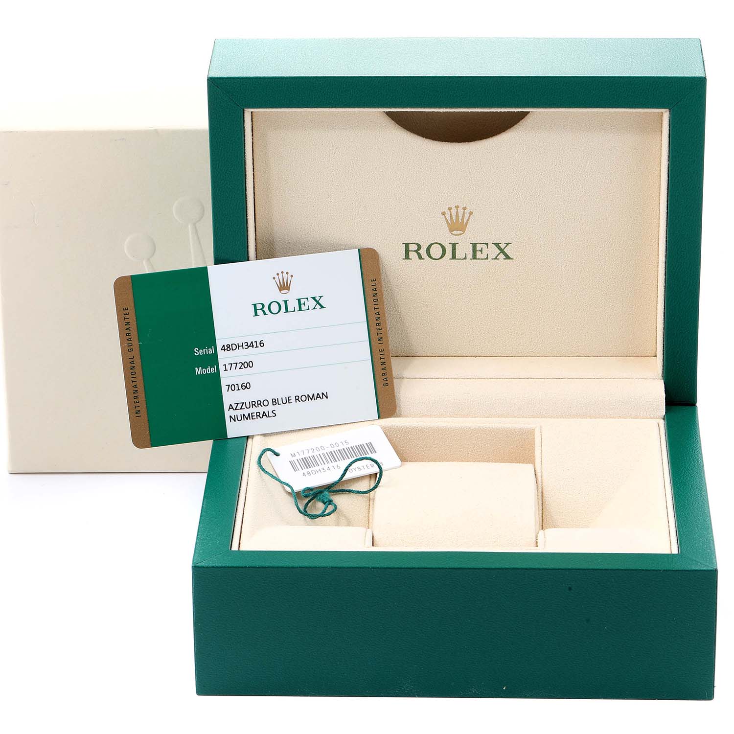 This image shows the open box and warranty card for a Mid-Size Rolex model 177200 with Azzurro Blue Roman numerals.