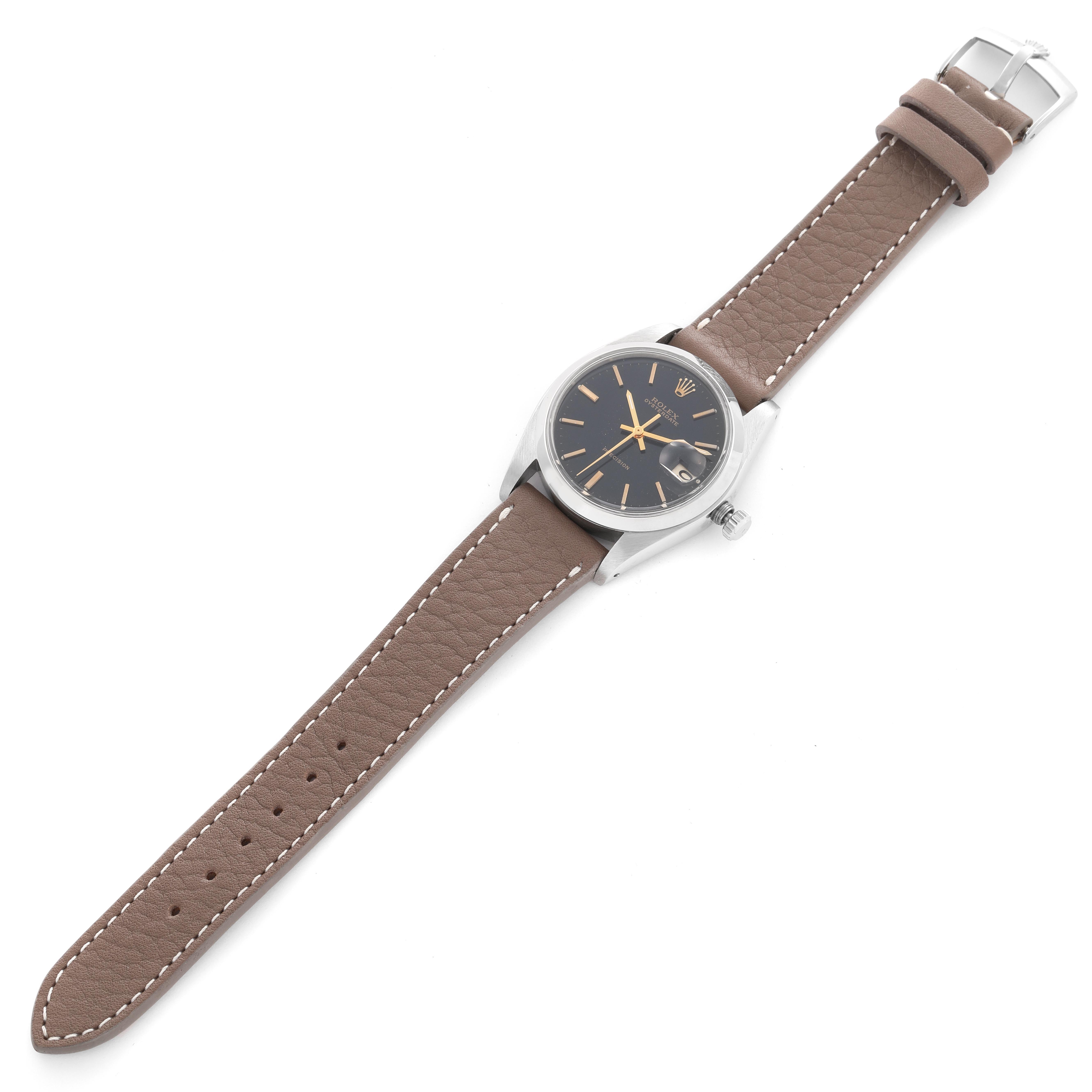 The Rolex Vintage Collection 6694 Men's Stainless Steel Black Dial 6694 Men's Stainless Steel Black Dial model is shown at a slight angle, highlighting its face, case, crown, and brown leather strap.