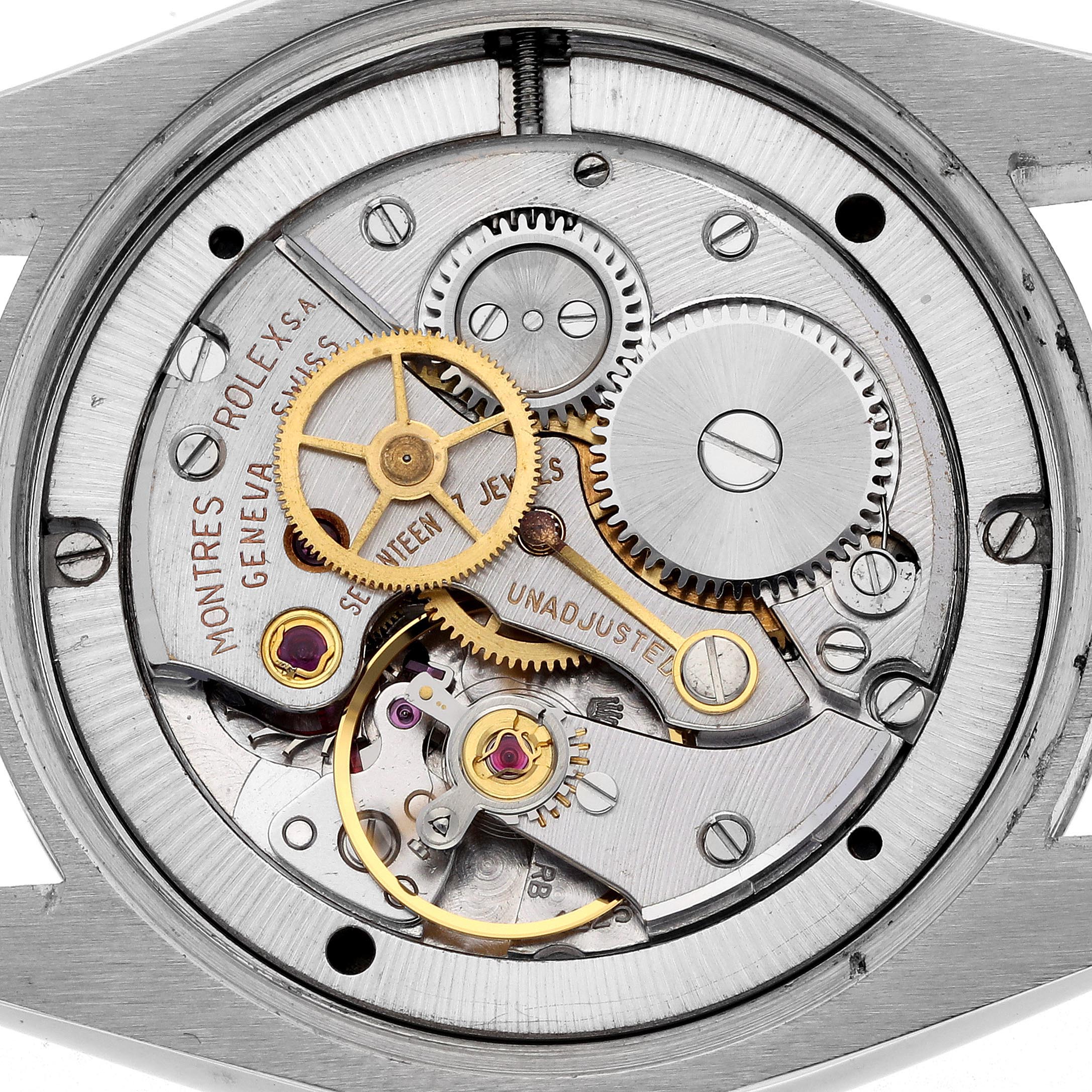 The image shows the movement mechanism of a Vintage Collection Rolex watch from the back.