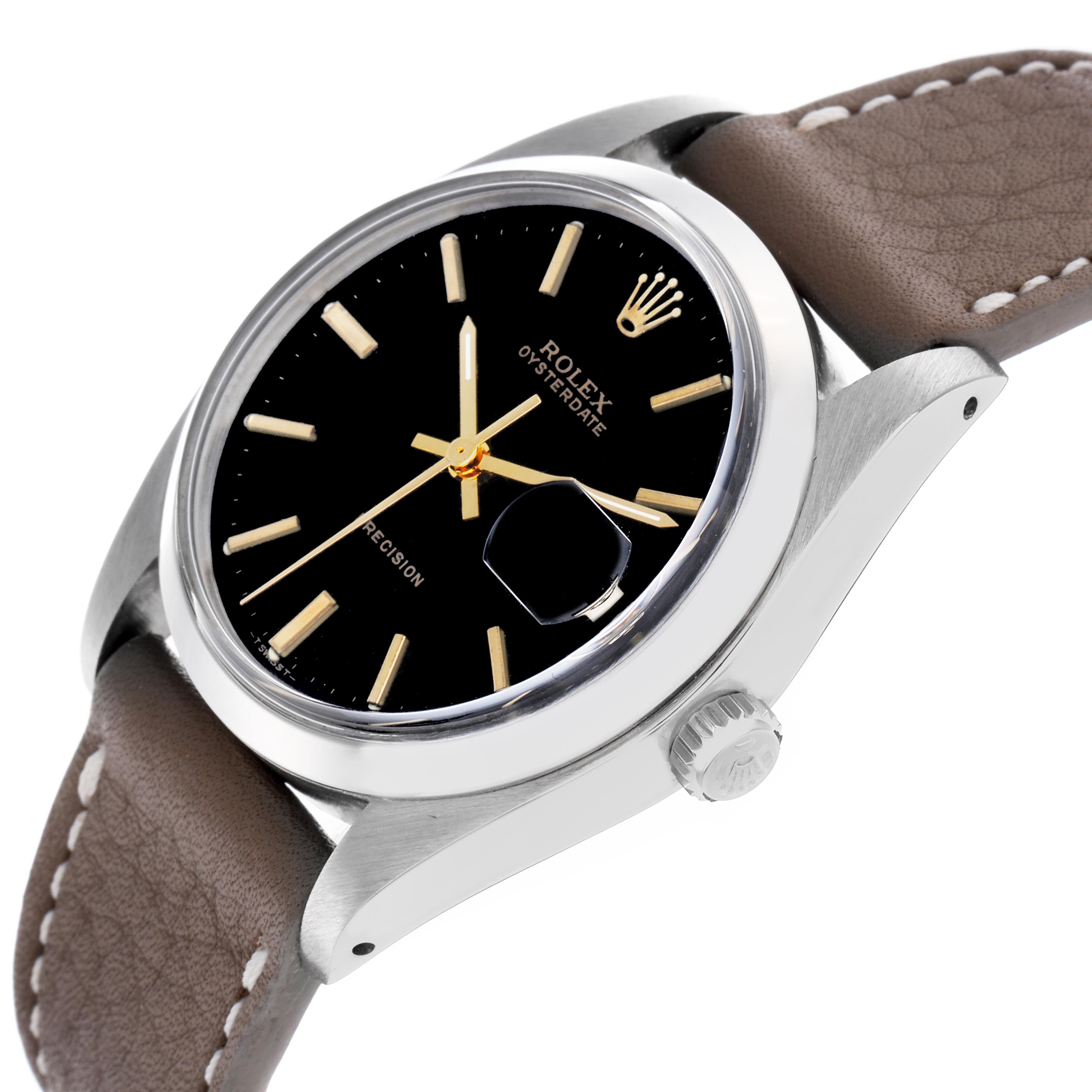 The Rolex Vintage Collection 6694 Men's Stainless Steel Black Dial 6694 Men's Stainless Steel Black Dial watch is shown at an angle highlighting its black dial, bezel, crown, and part of the brown leather strap.