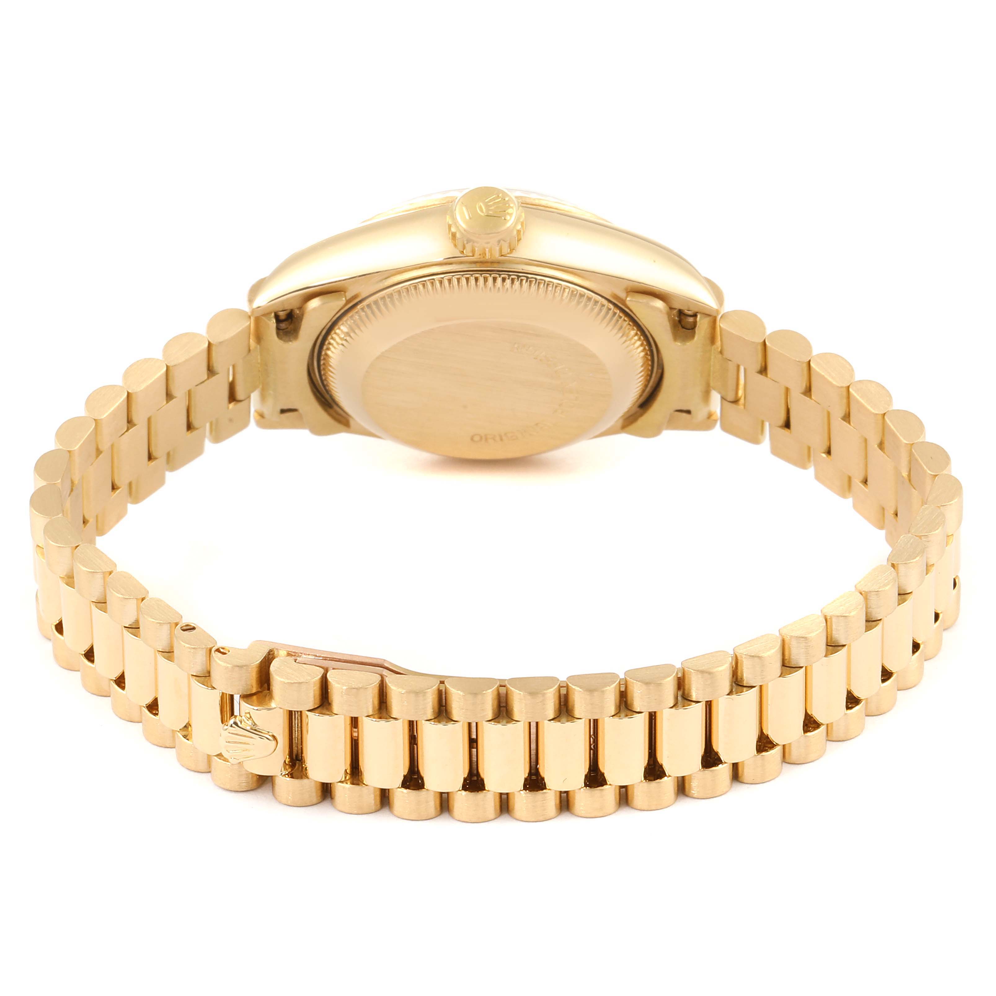 This image shows the back case and bracelet of a Rolex President 69178 Women
s Yellow Gold Champagne Dial 69178 Women
s Yellow Gold Champagne Dial model watch, viewed from an angle behind the crown.