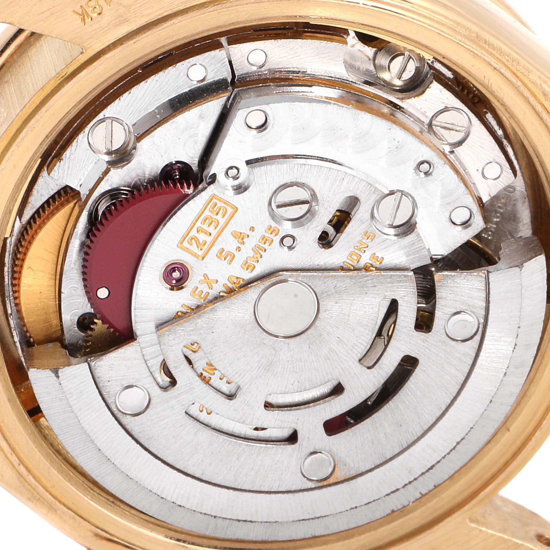 This image shows the internal movement mechanism of a Rolex President 69158 Women
s Yellow Gold Champagne Dial 69158 Women
s Yellow Gold Champagne Dial model watch from a close-up angle.
