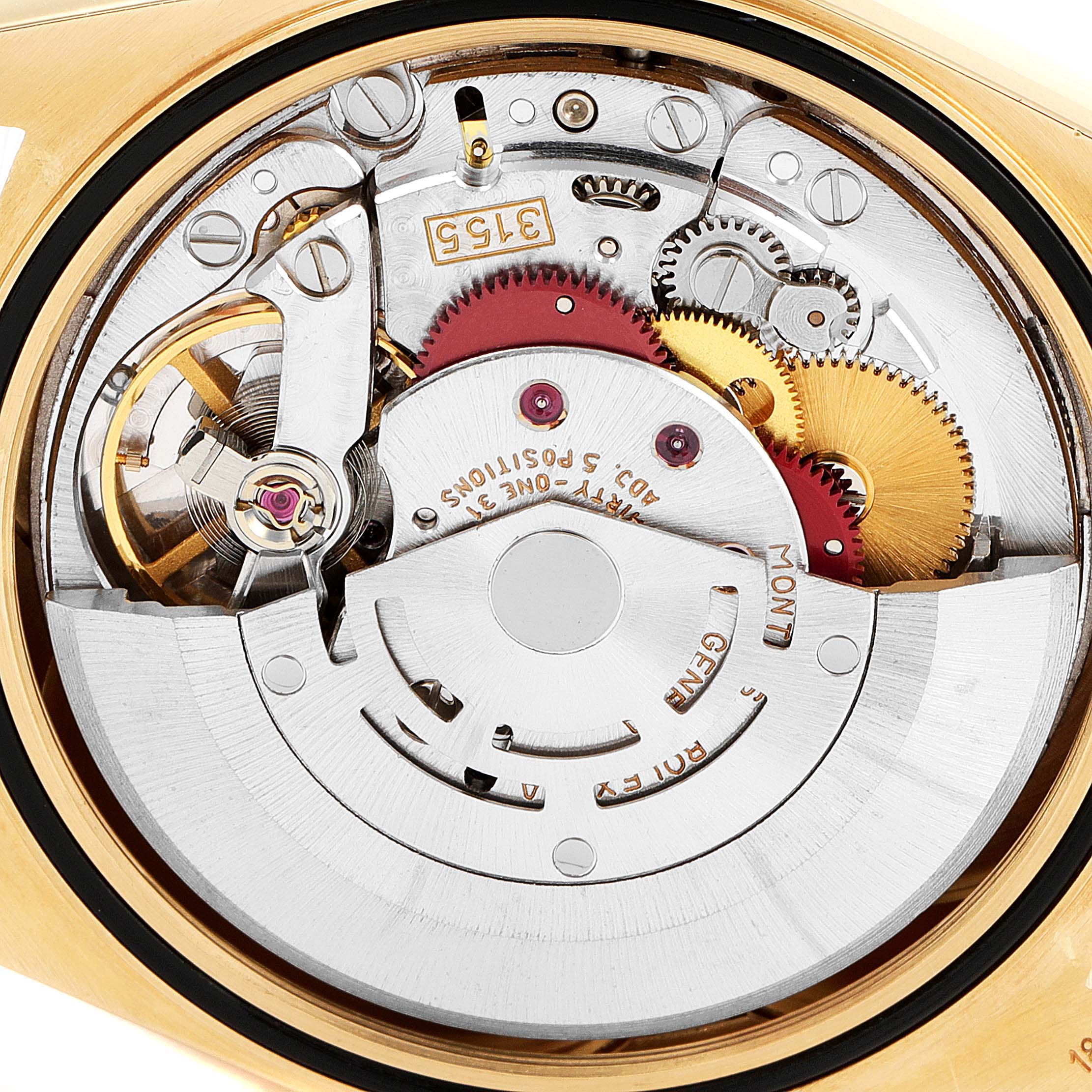 This image shows the internal mechanisms of a Rolex President 18238 Men's Yellow Gold Black Dial 18238 Men's Yellow Gold Black Dial model watch viewed from the back.
