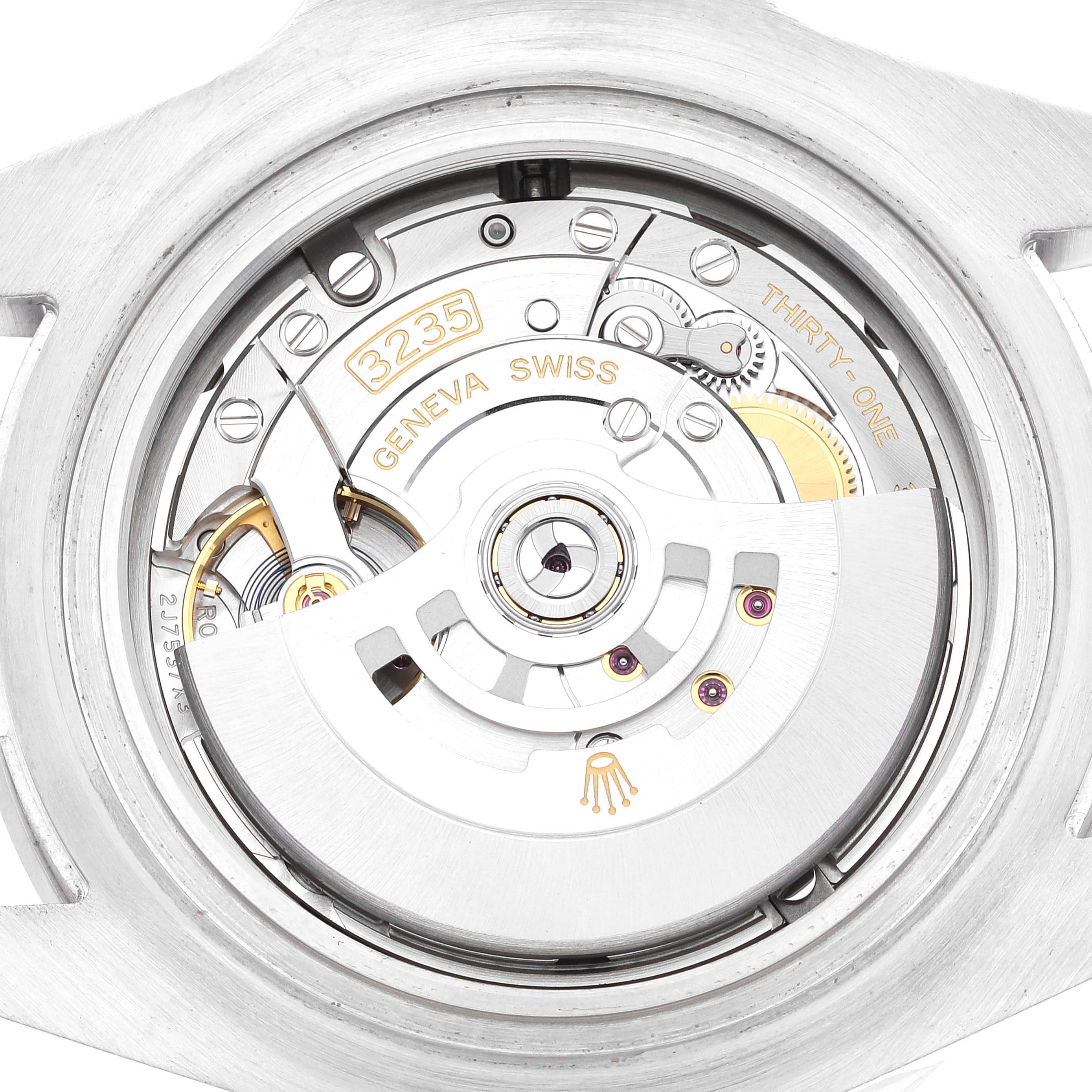 The image shows the movement of a Rolex Sea-Dweller 126600 Men's Stainless Steel Black Dial 126600 Men's Stainless Steel Black Dial watch from a back angle, highlighting its intricate mechanism.