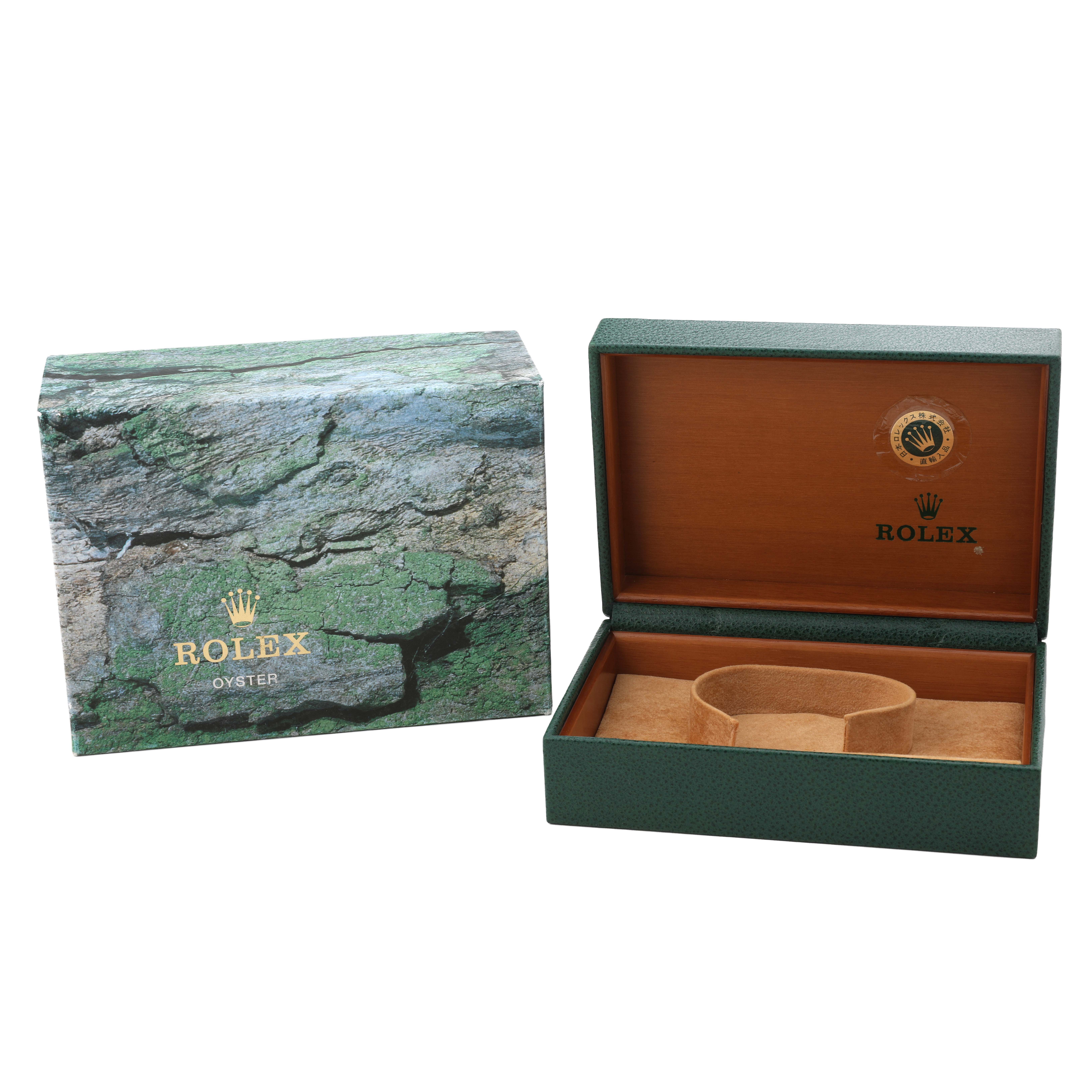 The image shows a Rolex Submariner 16610 Men's Stainless Steel Black Dial watch box and outer packaging, both open, displaying the interior.