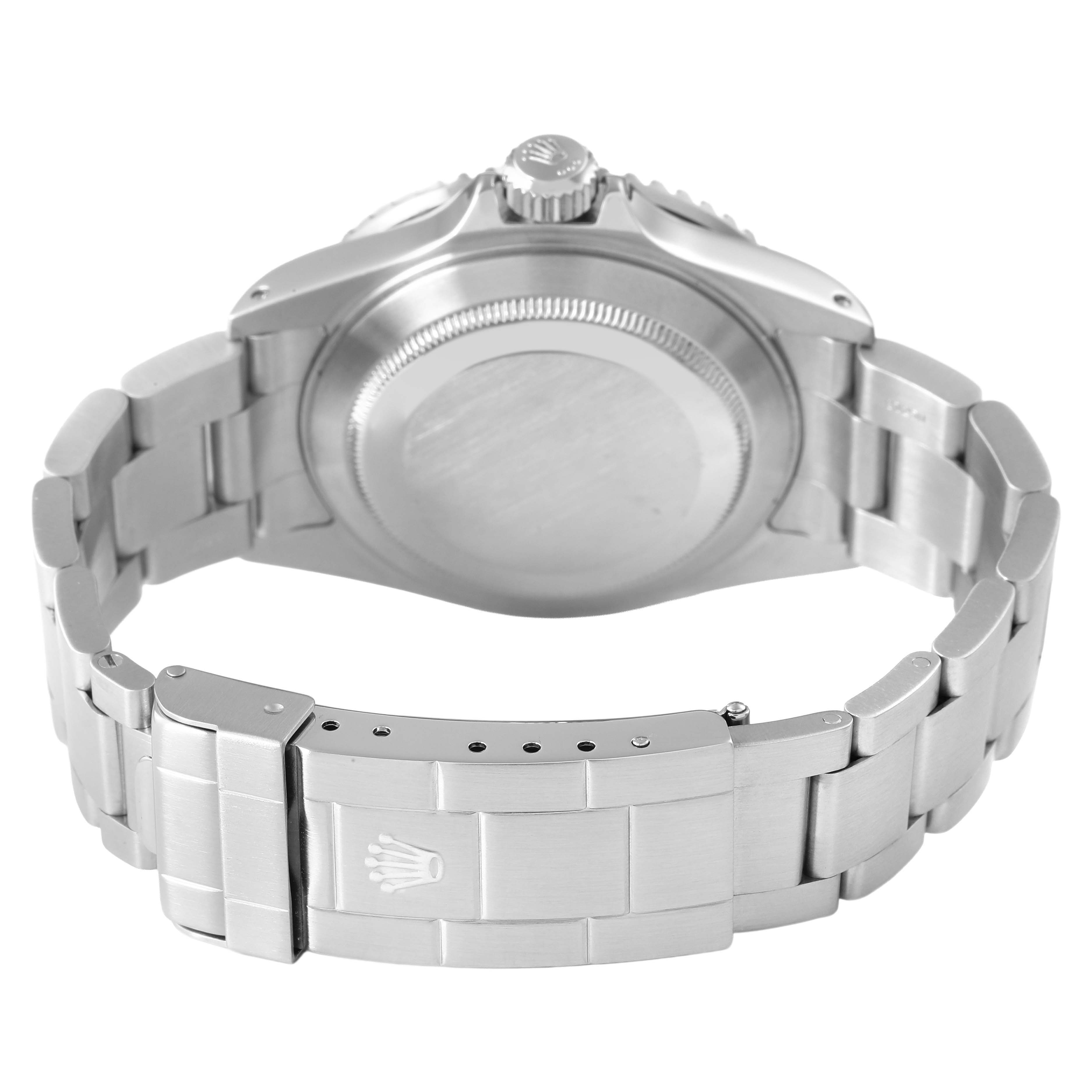 The image shows the back view of a Rolex Submariner 16610 Men's Stainless Steel Black Dial watch, highlighting the case back and bracelet with the clasp.