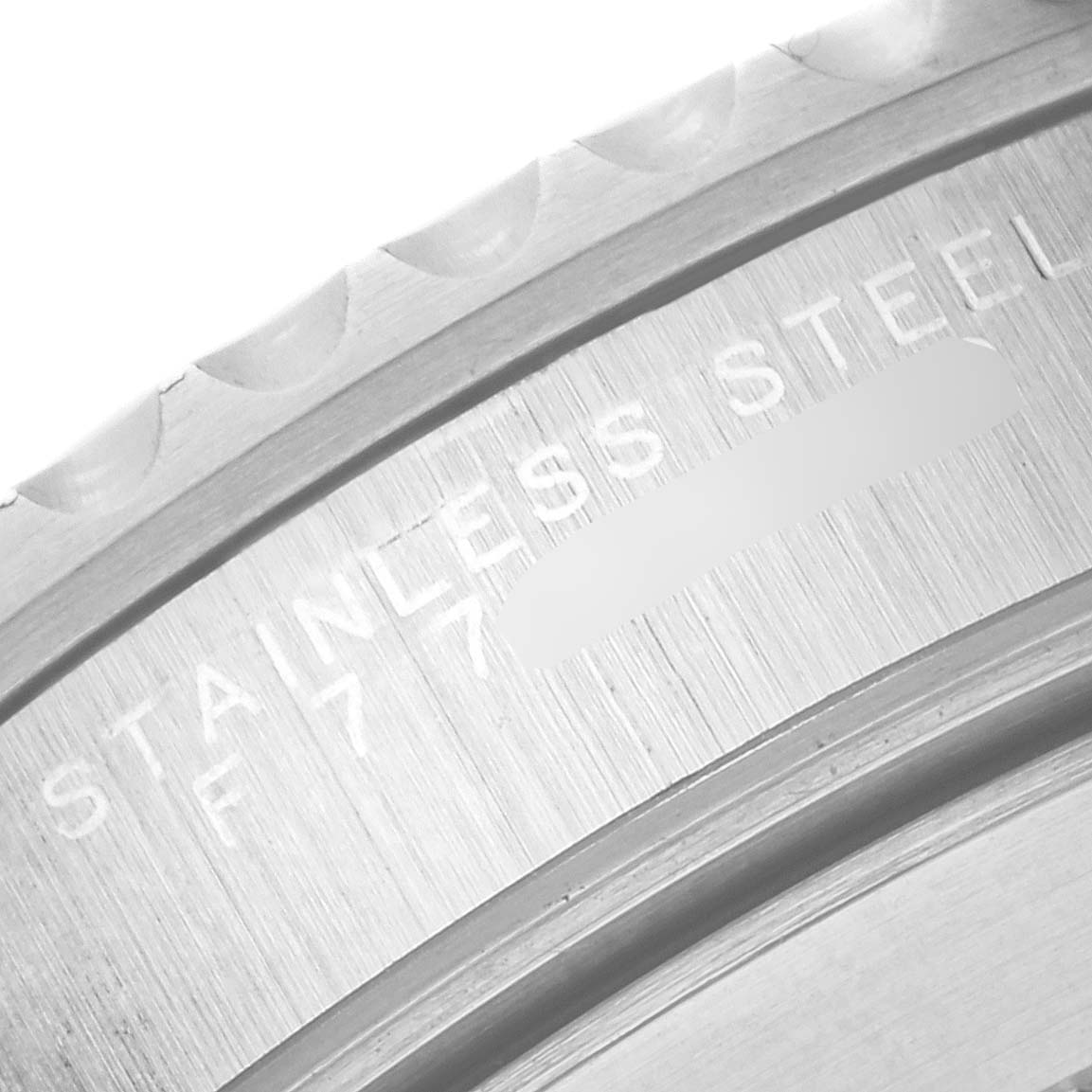 This image shows a close-up of the bezel and rehaut engraving on a Rolex Submariner 14060 Men
s Stainless Steel Black Dial 14060 Men
s Stainless Steel Black Dial watch.