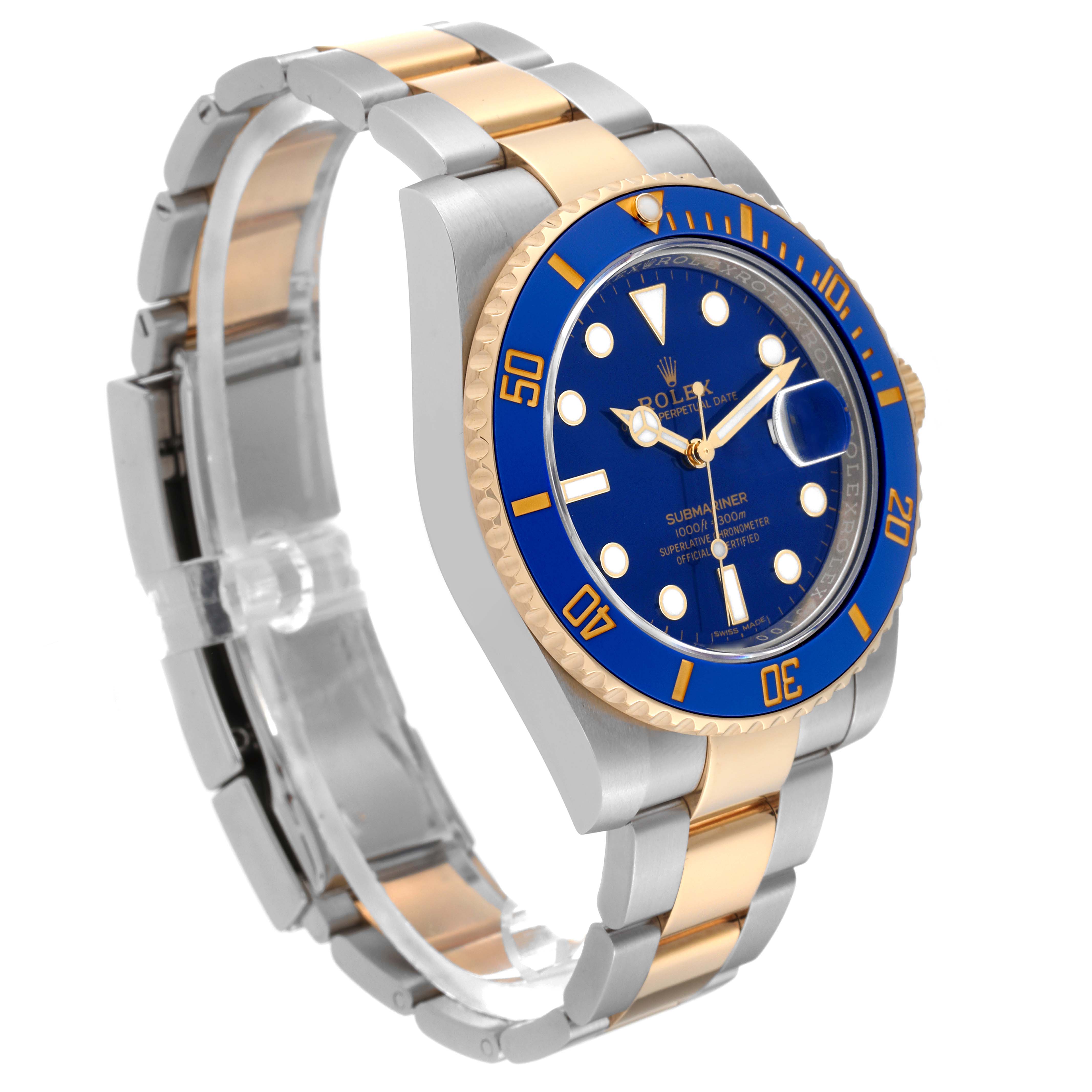The image shows an angled view of a Rolex Submariner 116613LB Men's Steel and Gold (two tone) Blue Dial 116613LB Men's Steel and Gold (two tone) Blue Dial watch, highlighting the blue dial, bezel, and two-tone bracelet.