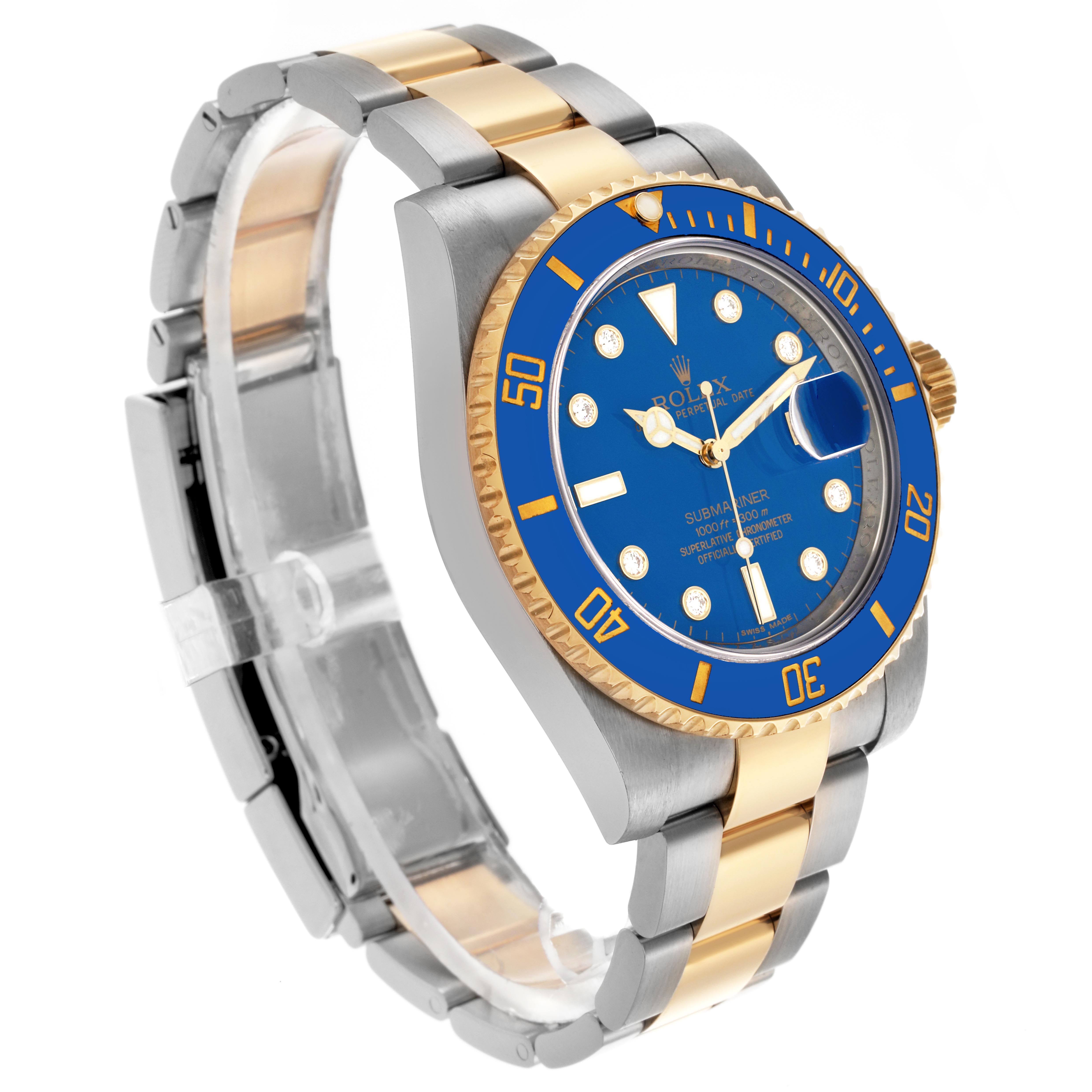 The Rolex Submariner 116613LB Men's Steel and Gold (two tone) Blue Dial 116613LB Men's Steel and Gold (two tone) Blue Dial watch is shown at an angled side view displaying its blue and gold bezel, dial, and two-tone bracelet.