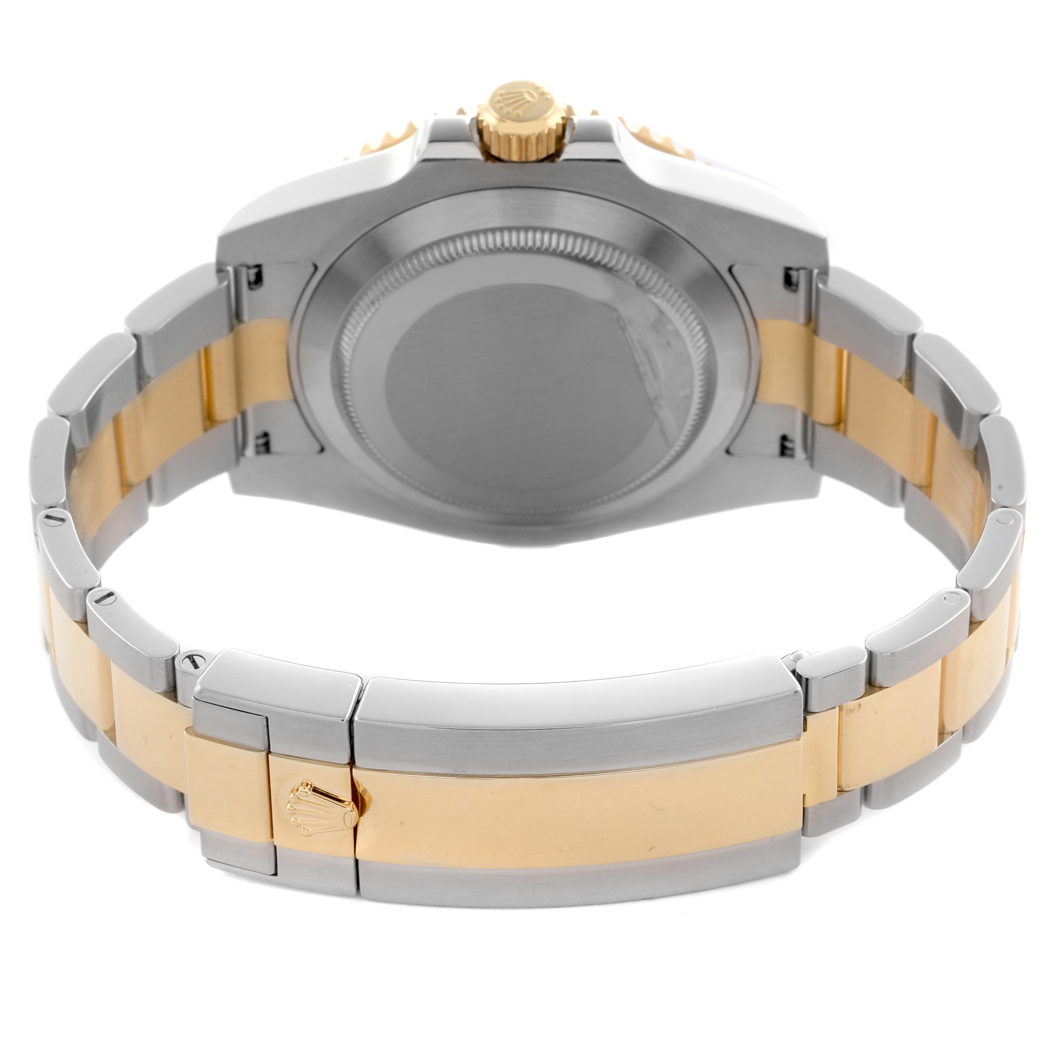 The image shows the back and bracelet of a Rolex Submariner 116613LB Men's Steel and Gold (two tone) Blue Dial 116613LB Men's Steel and Gold (two tone) Blue Dial, highlighting the two-tone metal and clasp.