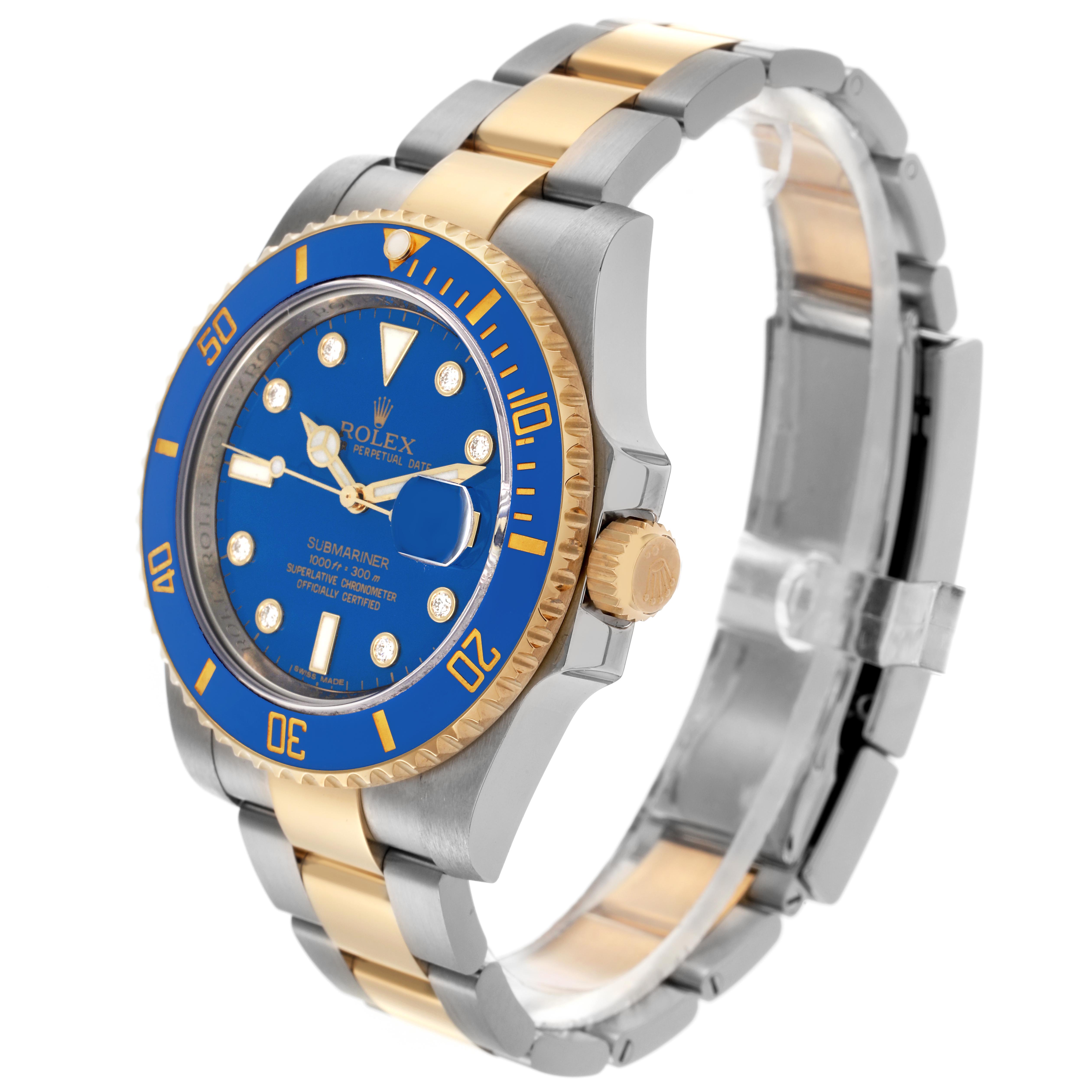 The Rolex Submariner 116613LB Men's Steel and Gold (two tone) Blue Dial 116613LB Men's Steel and Gold (two tone) Blue Dial watch is shown at a three-quarter angle, highlighting its blue dial, bezel, and two-tone bracelet.