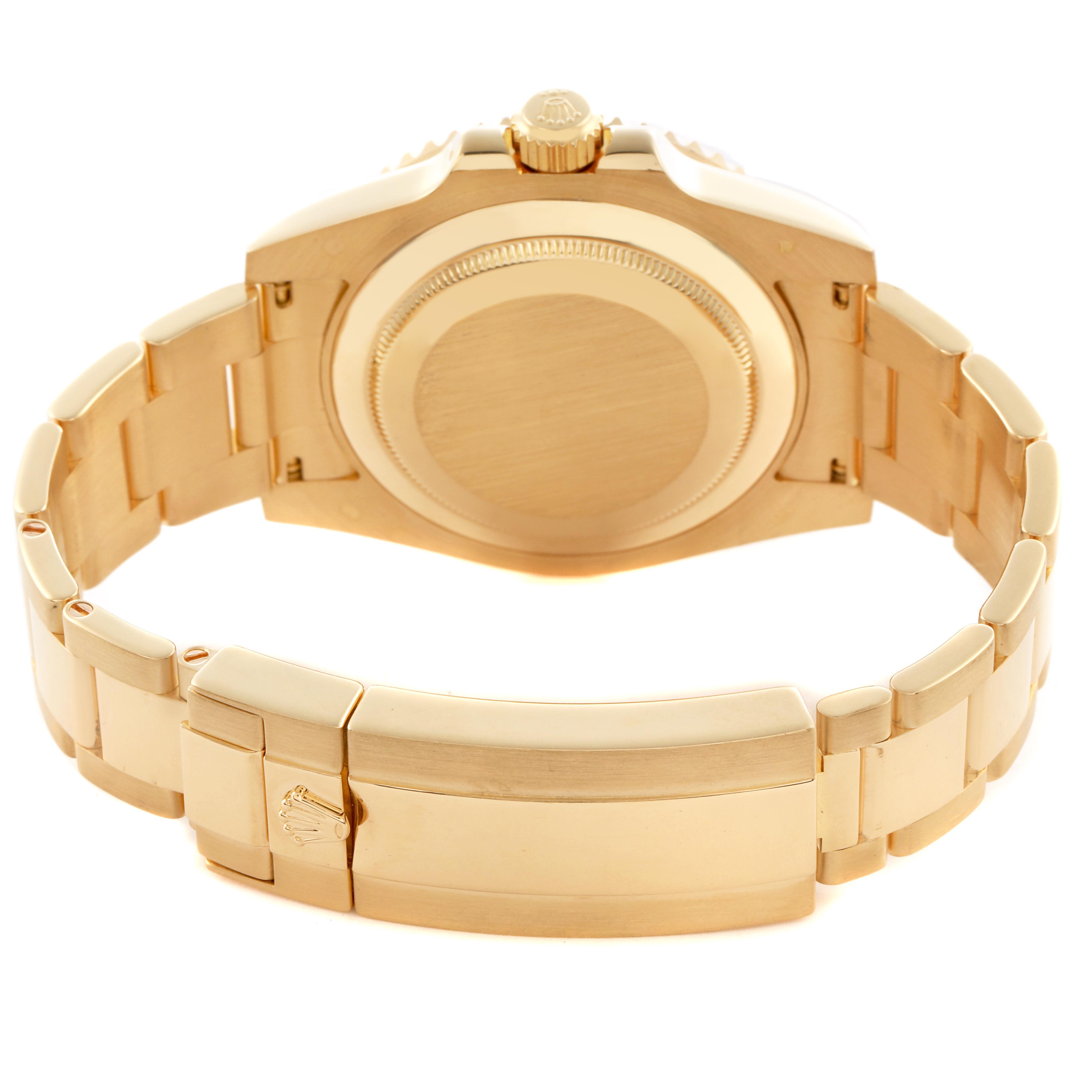 The image shows the back view of a gold Rolex Submariner 116618LB Men's Yellow Gold Blue Dial 116618LB Men's Yellow Gold Blue Dial, highlighting its clasp, bracelet, and case back.