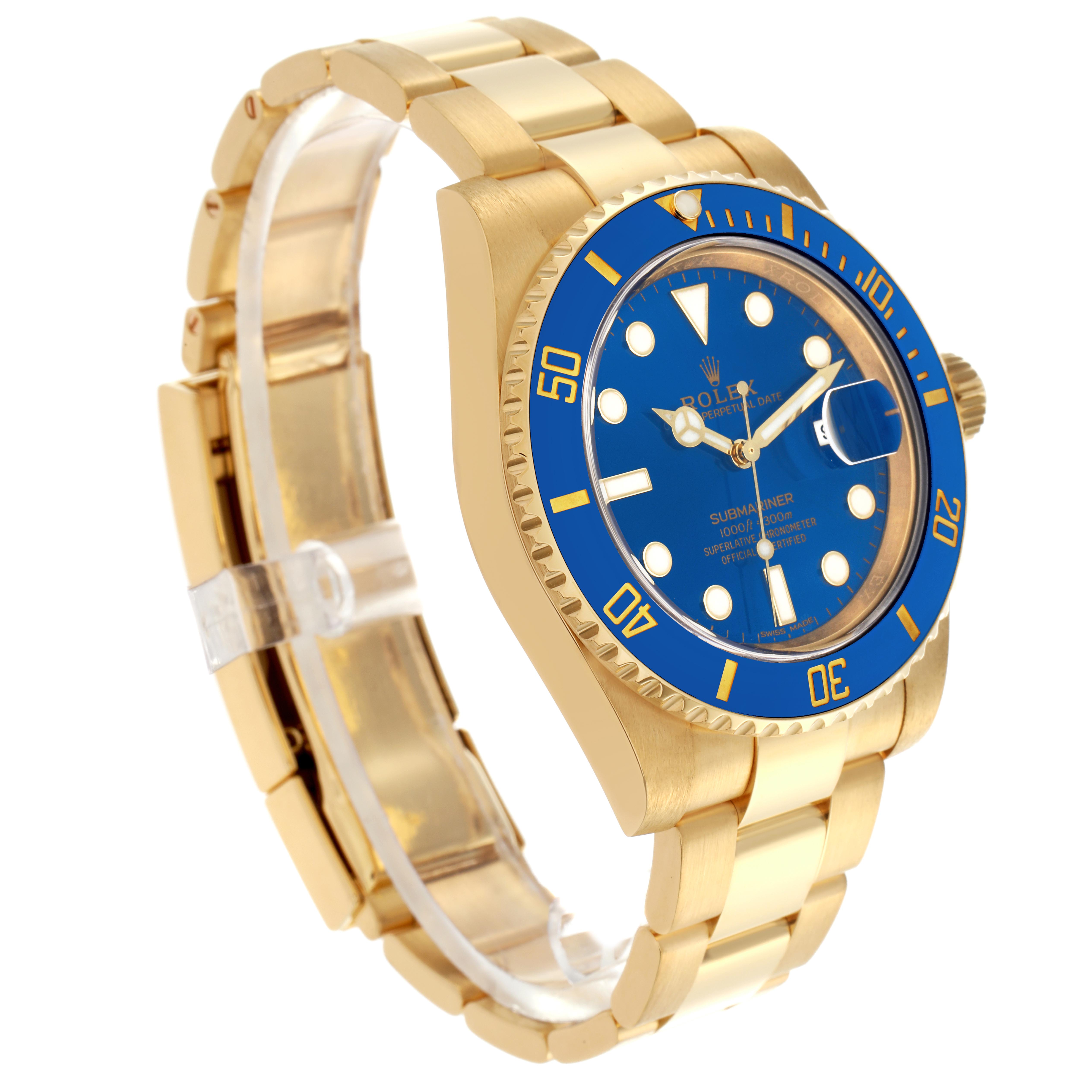The Rolex Submariner 116618LB Men's Yellow Gold Blue Dial 116618LB Men's Yellow Gold Blue Dial watch is shown at a three-quarter angle, highlighting the blue dial, gold bezel, and bracelet.