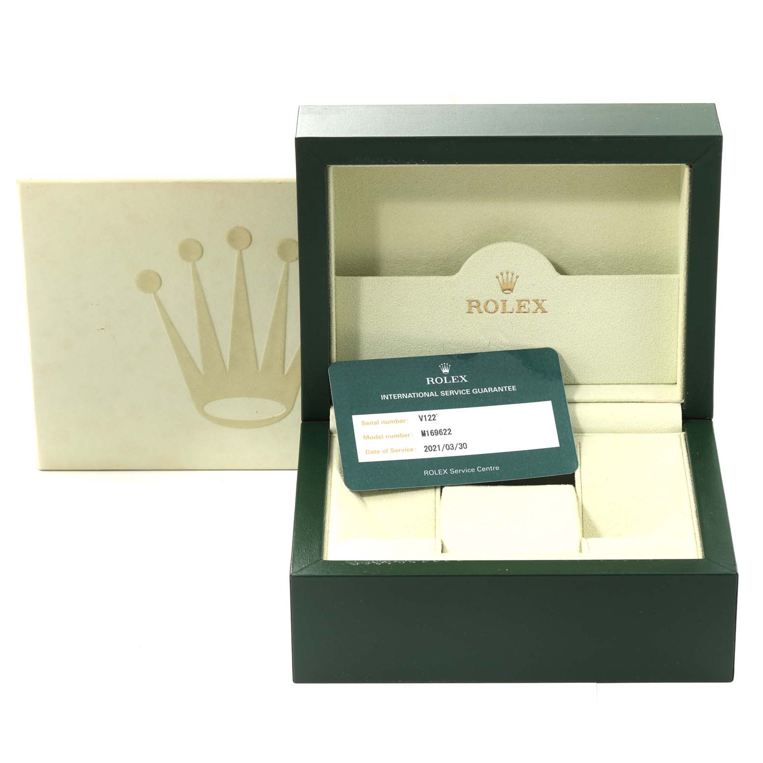 The image shows the Rolex Yacht-Master 169622 Women
s Stainless Steel Silver Dial 169622 Women
s Stainless Steel Silver Dial watch box with the warranty card placed inside.